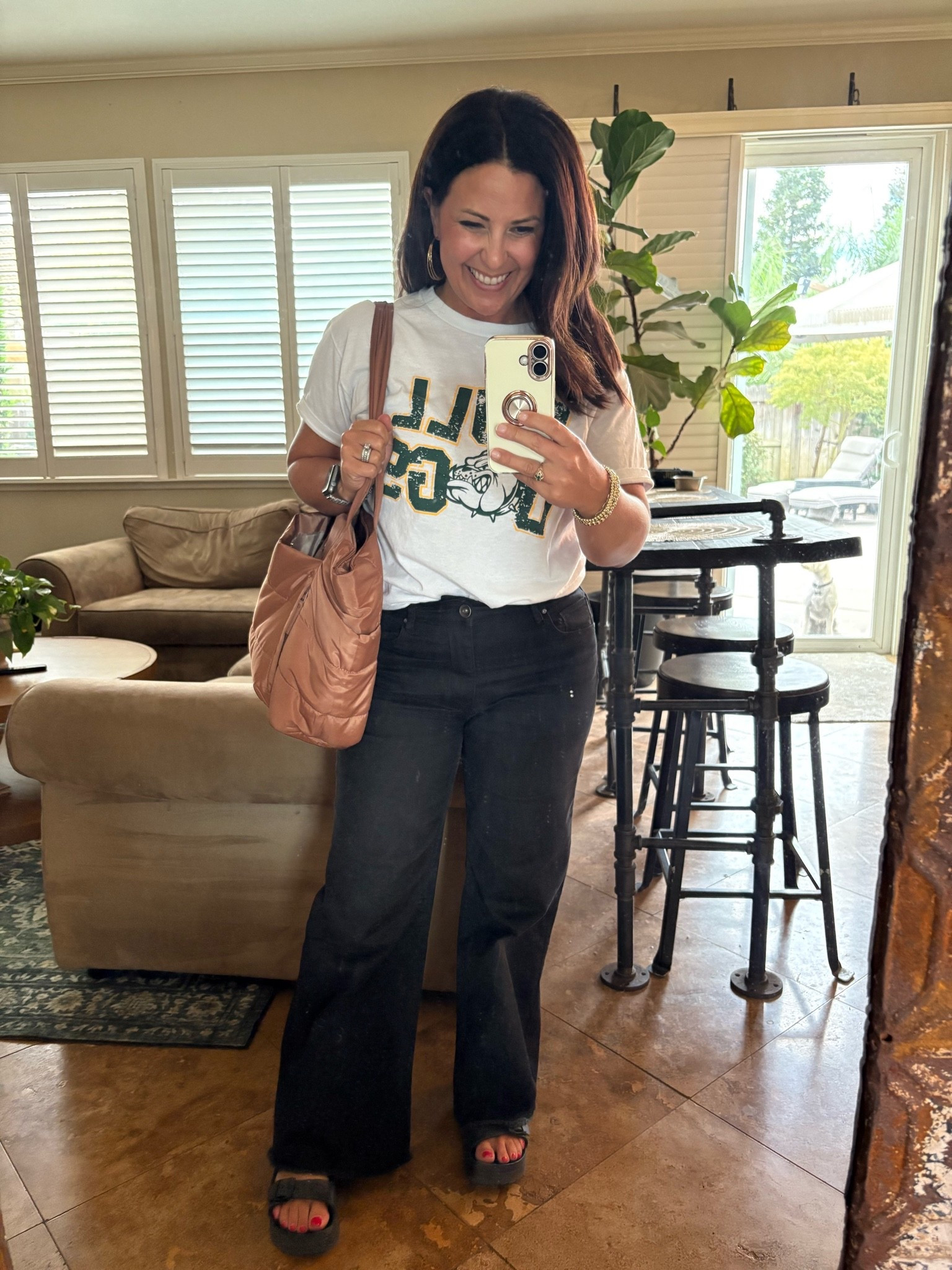 School Spirit Day, but make it comfortable! 💚 This teacher outfit is proof that spirit wear doesn’t have to mean sacrificing comfort. I paired my favorite school spirit tee with black wide-leg jeans and my comfy Birkenstock dupes—the perfect shoes for a full day on my feet! 🙌🏼

These sandals are such a good affordable alternative to the Birkenstock look and are SO comfortable for teaching. Linking everything in my LTK! 🤎

#TeacherOutfit #TeacherStyle #SchoolSpiritDay #TeacherFashion #TeacherWorkwear #CasualTeacherOutfit #BirkenstockDupes #ComfortableShoes #WideLegJeans #BackToSchoolStyle #PetiteStyle

#LTKPetite #LTKSeasonal #LTKWorkwear