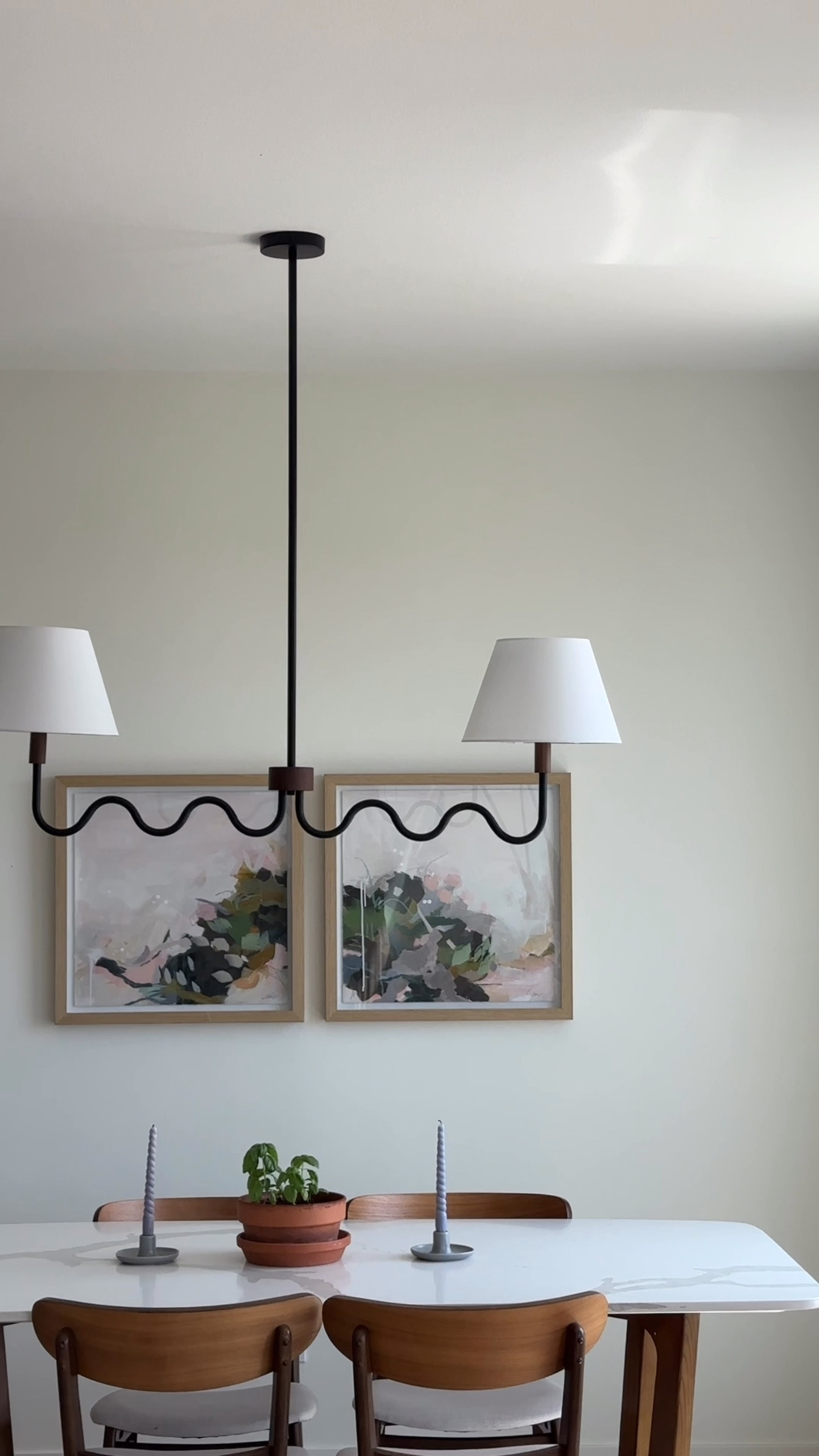 dining room glow up ✨
this new Wayfair light fixture is everything — a perfect mix of modern design, classic charm, and just a touch of quirky whimsy. the squiggly bar adds a fun sculptural moment, while the classic white lampshades keep it timeless. it totally transformed the space and makes every dinner feel a little more special.

Wayfair light fixture, modern dining room lighting, classic pendant light, whimsical light fixture, squiggly light bar, sculptural lighting, dining room decor, light fixture with shades, statement lighting, transitional lighting style, modern classic home, unique dining room light, cozy dining space, dinner party lighting, eclectic modern lighting



#LTKcasa #LTKsummer #LTKcanada