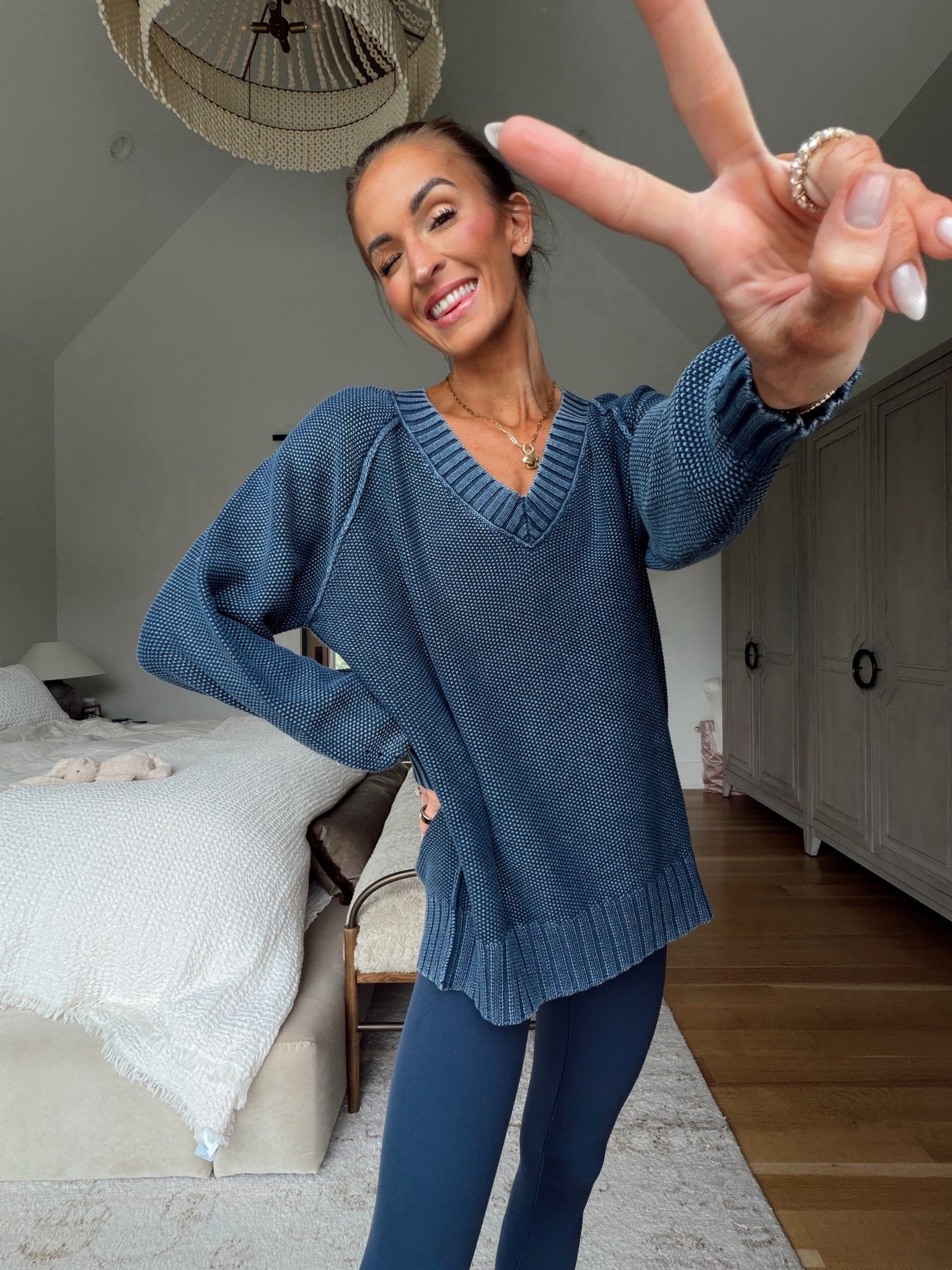 this knit sweater is on sale today! 🙌🏼 love the oversized fit, longer length, and pointelle detailing on the sleeves 😍 looks cute paired with leggings or jeans! runs big / wearing xs 

#LTKSaleAlert