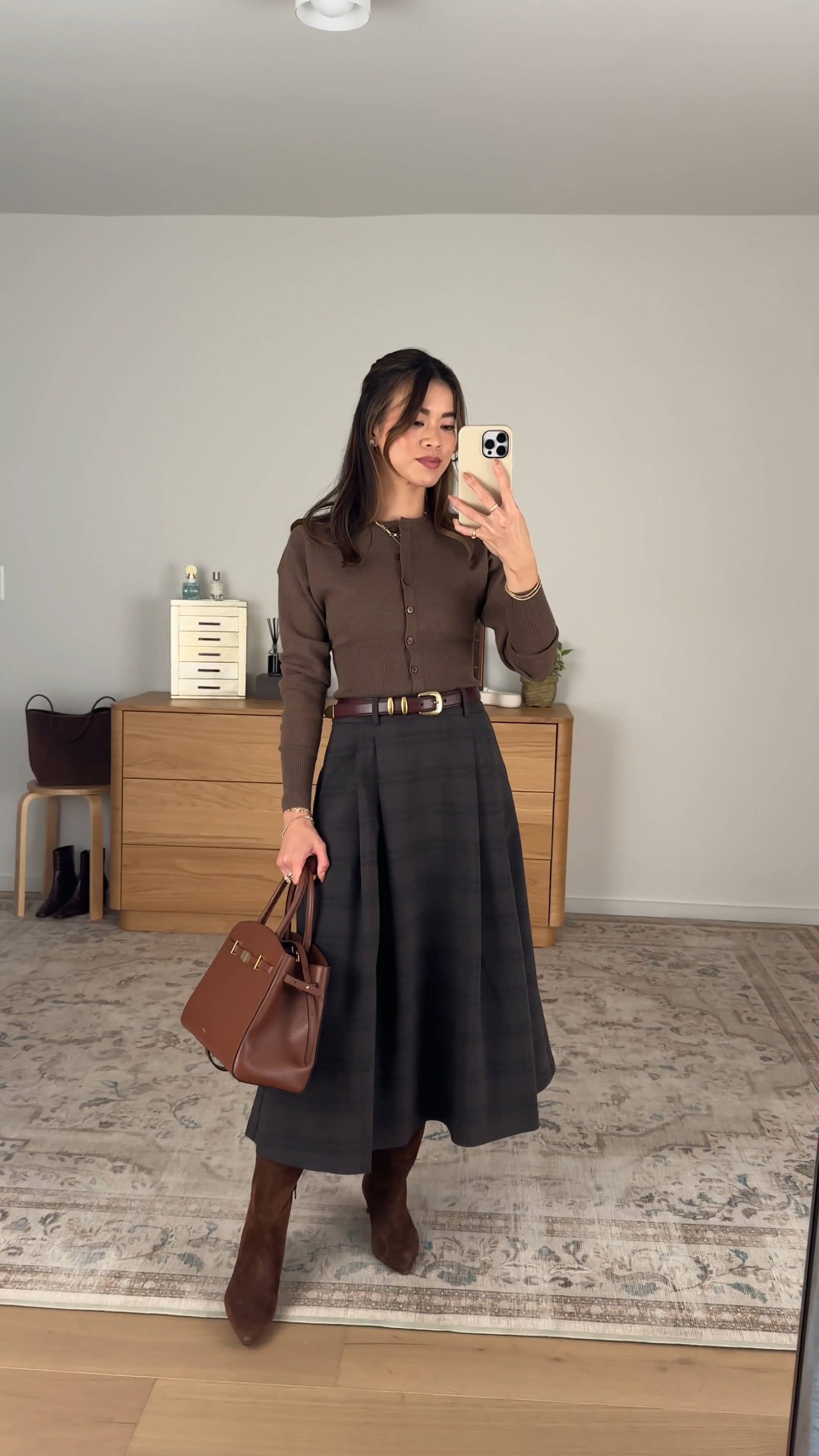 This long skirt from @Aritzia is perfect for fall! It’s super thick and warm.

Sizing info:
-Aritzia Golightly Cardigan - Wonder Yarn (Size XS in Heather Dark Chocolate)
-Aritzia Enterprise Skirt - Eversential
(Size 0 in Cacao Nib Brwn/Grey)

Aritzia best sellers, best pieces from Aritzia for petite, Aritzia skirts for petite, what skirt from Aritzia will fit if youre petite, Petite style guide, how to dress if you’re petite, Petite style, petite fashion, mom outfit, mom style, petite skirt, petite outfit ideas, petite outfits, best skirt for petite, petite skort, fall style, fall outfits, autumn outfit, vacation outfits, Aritzia try on, fall boots, tall boots, fall jacket, long skirt, plaid skirt

#LTKootd #LTKSeasonal #LTKPetite
