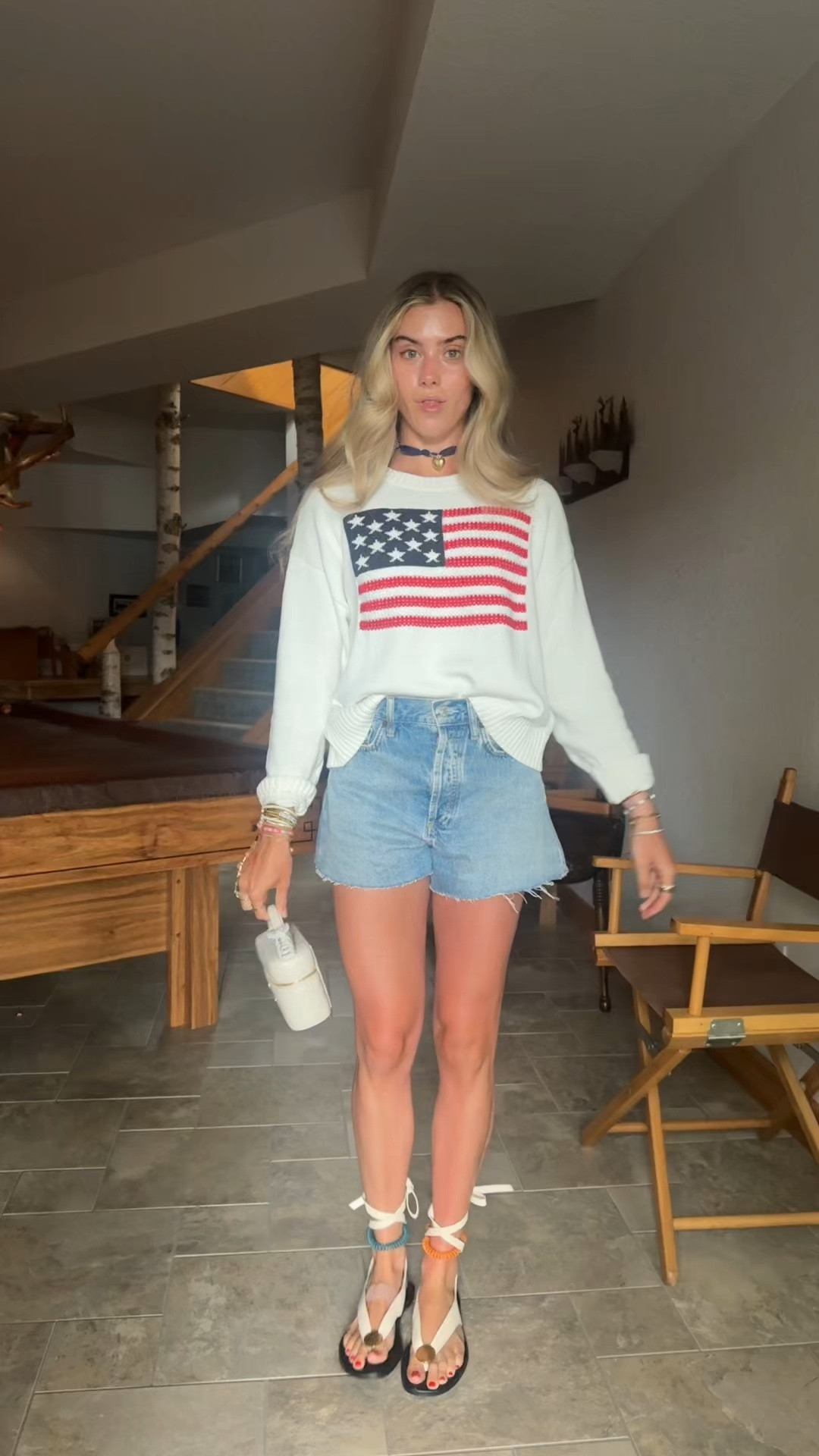 July 4th outfit! My @oldnavy American flag sweater I sized up to size small to make it baggy. My favorite denim shorts @nuuds  size 24. My wrap shoes are amazon and my bikini underneath is Tiger Mist.

#LTKootd #LTKTravel #LTKdayinmylife