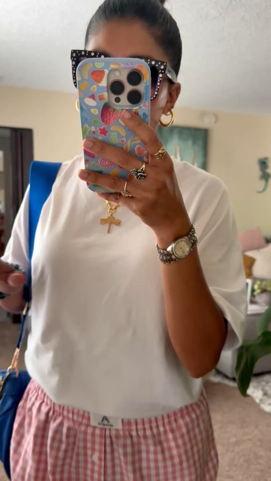 Easy everyday outfit but make it chic 🤍✨
I styled this oversized tee tucked under my bra for that effortless, cinched look (trust me… game changer 🙌). Paired it with these lightweight gingham pants for the perfect casual + put-together vibe.

This is my go-to for running errands, coffee runs, or just feeling cute and comfy without trying too hard. Add a statement sunglass + pop of color bag and you’re instantly elevated 💙

Everything is easy to mix, match, and rewear all season long!


casual outfit, everyday style, oversized tee outfit, t shirt styling hack, tucked shirt trick, gingham pants outfit, spring outfit ideas, summer casual look, mom style outfit, effortless chic outfit, comfy outfit ideas, relaxed fit outfit, neutral outfit with pop of color, street style casual, minimal chic outfit, airport outfit idea, coffee run outfit, laid back fashion, simple outfit inspo

#casualstyle #everydayoutfit #ootdstyle #springoutfits #summerstyle #effortlessstyle #momstyle #comfychic #outfitinspo #ltkstyle #ltkfashion #amazonstyle #ginghamstyle #neutralstyle #streetstyle

#LTKmomlife #LTKootd #LTKSeasonal