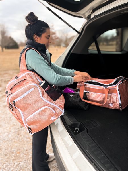 The Rebel Dream Backpack!  Includes an expandable shoe compartment, portable phone charger, and lots of room! 

@RebelAthletic #RebelAthleticPartner #ad #RebelAthletic #RebelLevel

cheer, dance, sparkle, glam, makeup bag, duffel bag, gym style, workout gear 

#LTKfitness #LTKitbag #LTKbeauty