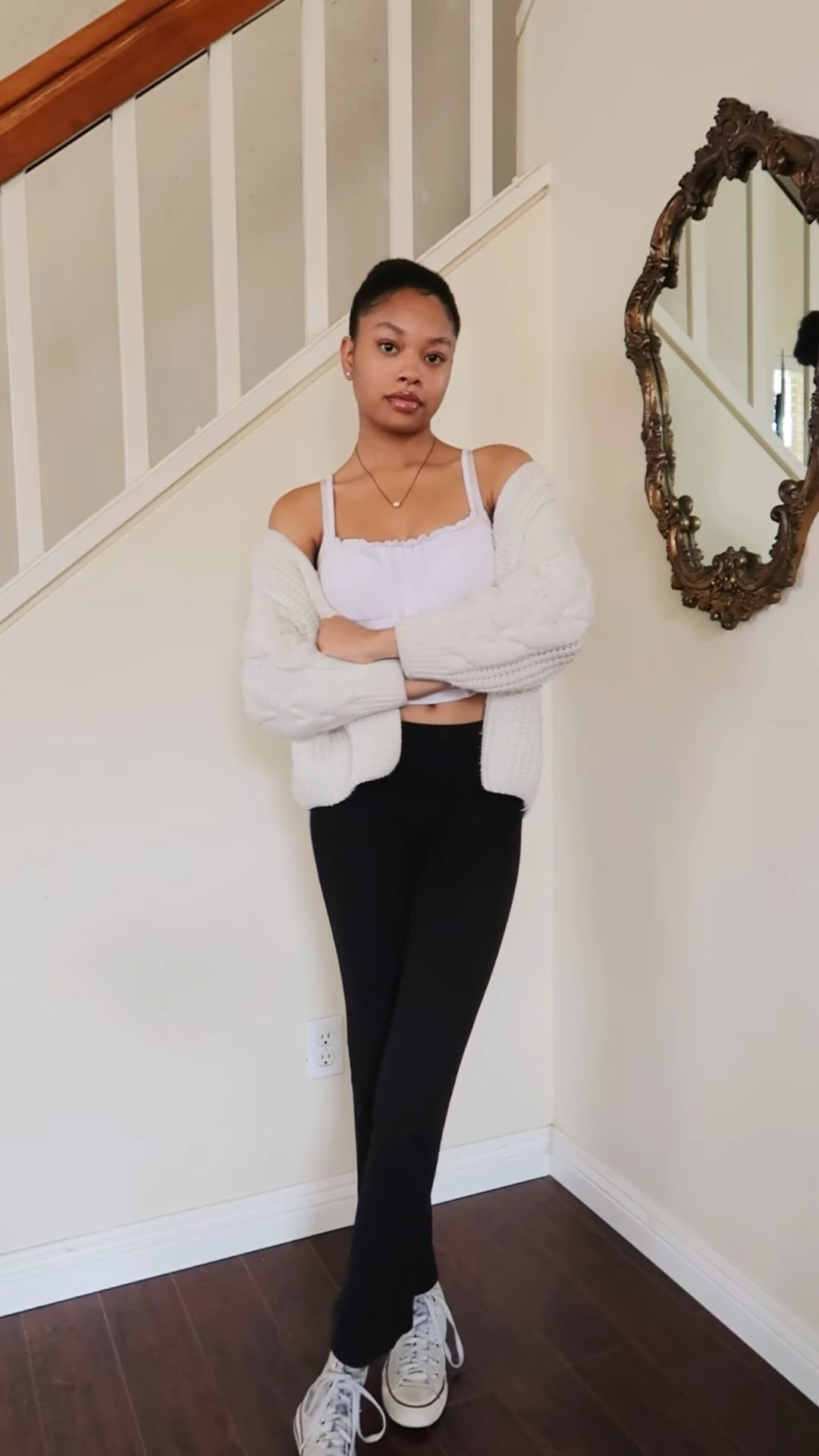 white cami tank, ruffle top, crop top, black leggings, flare leggings, black flare pants, black yoga pants, white cardigan, cable knit sweater, white sneakers, white shoes, converse, high top converse 

#LTKVideo #LTKstyletip #LTKfindsunder100