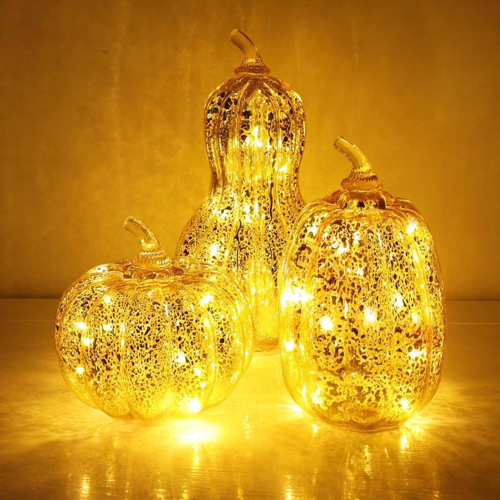 NEEDOMO Lighted Glass Pumpkin Decor, Set of 3 Gold Mercury Glass Pumpkins with Lights and Timer f... | Amazon (US)