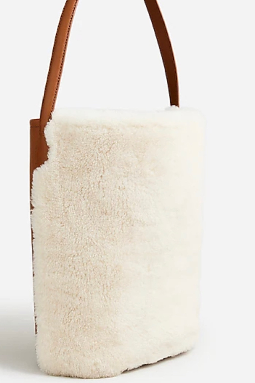 This gorgeous sherpa and Leather bag is on major sale 50% off!