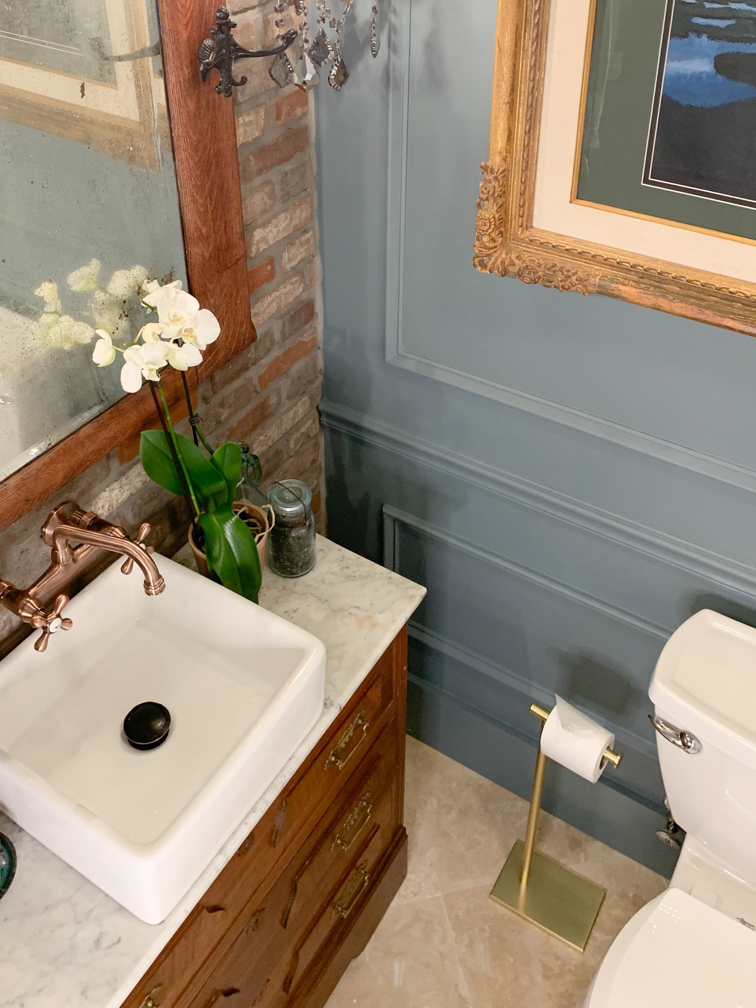 Something about the simplicity and drama of a single flower: it really does dress up a space for photos!  Please connect with any questions about our little half bath: the dresser is vintage as are the framed art and mirror.  Everything else is linked right here ❤️

#LTKfindsunder50 #LTKSpringSale #LTKhome