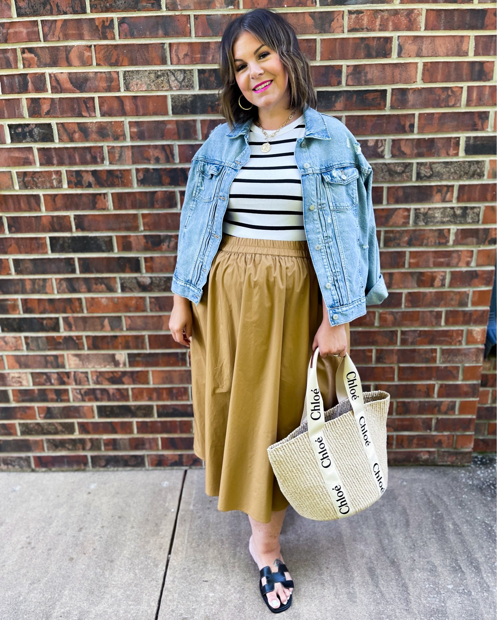 These new Target midi skirts are a summer to fall must have! You can wear them right now with all your summer faves and take them right into fall later. These are perfect for work outfits and teacher outfits, too. They come in regular and plus sizes XS-4X and are under $30! 

#LTKMidsize #LTKPlusSize #LTKOver40