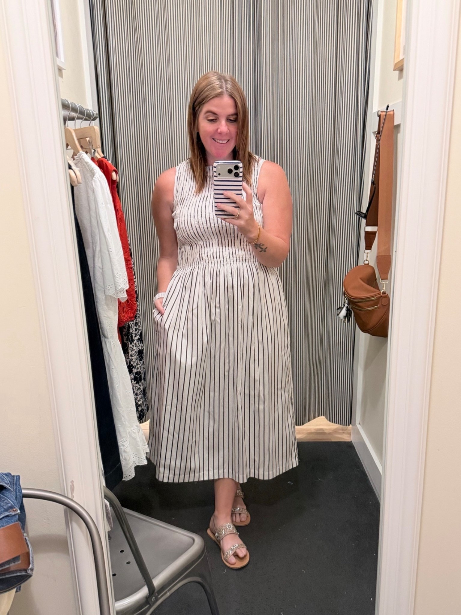 I am a sucker for blue and white stripes and this dress is so good! The dress screams spring and summer and you can dress it up or down for anything from work to date night! The dress runs TTS and is available in a few different color options! 

#LTKootd #LTKOver40 #LTKMidsize