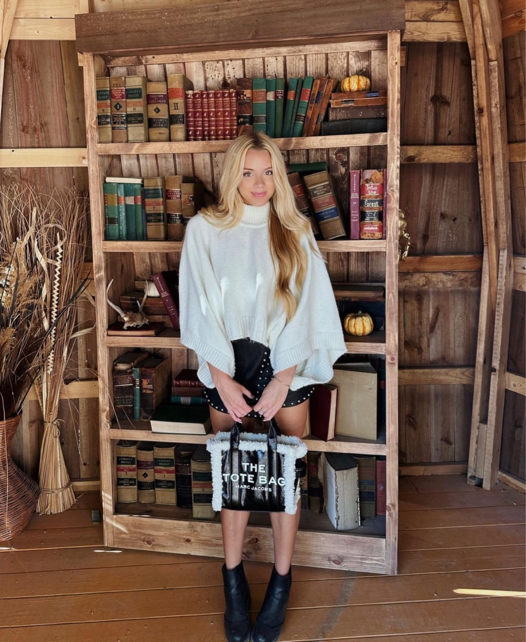 Fall neutral outfit, oversized sweater and black leather skirt paired with Marc jacobs tote bag and black leather booties! 🖤
Skort is free people size 2, sweater is Bishop + Young Batwig Knit Poncho, it looks like anthropologie doesn’t sell it anymore but it is available on Poshmark!! 
Bag is from Marc jacobs site, boots are from a boutique but I linked similar ones

#LTKMostLoved #LTKmidsize #LTKSeasonal