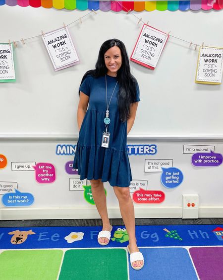 One of my most popular dresses from the start of this school year is available again! 🍎 It comes in a pink and green, too! •••

•••My lanyard is from the amazing @itsastarbaby — she makes the BEST! // My espadrille slides are c/o @fashionjunkeedotcom•••

Teacher outfit • Old Navy • Back to School • Teaching • Old Navy Dress #LTKBacktoSchool #oldnavy #ltksalealert #ltkunder50

#LTKFind #LTKSeasonal #LTKworkwear