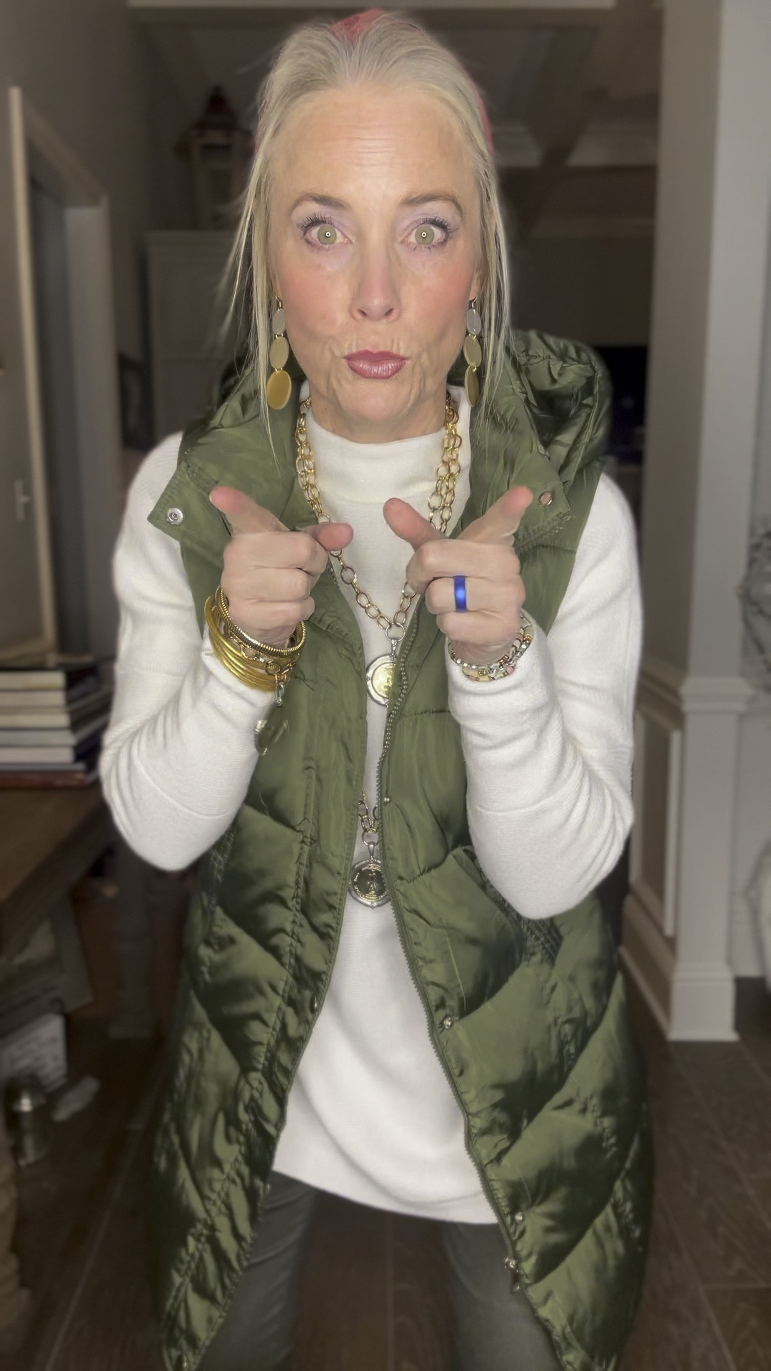 Cold and rainy weather in south Louisana calls for warm layers!

I love this FP look for less sweater in white from Amazon with a fitted white ribbed long-sleeve tee underneath for added warmth. I paired it my favorite super inexpensive Shein faux skinny pants in army green with fleece-lined tights underneath, warm socks, black Chelsea boots, and my favorite army green midi length puffer vest. 

As a reminder for reference, I am 53, 5’8, and 140ish pounds, and I’m in my true size medium in everything. Boots are TTS. 

No outfit is complete without some finishing touches (accessories). I’m wearing my usual gold bracelets from Amazon, Gorjana, and Etsy. Earrings are from. Nickel and Suede. Watchband and headband are also from Amazon, and the gorgeous coin necklaces and matching bracelet are from Jennifer Ponson Designs. She can’t be linked here but let me know if you would like me to send you a separate link and discount code for 10% off. 

#LTKTreatYourself

#LTKover40 #LTKsalealert #LTKmidsize