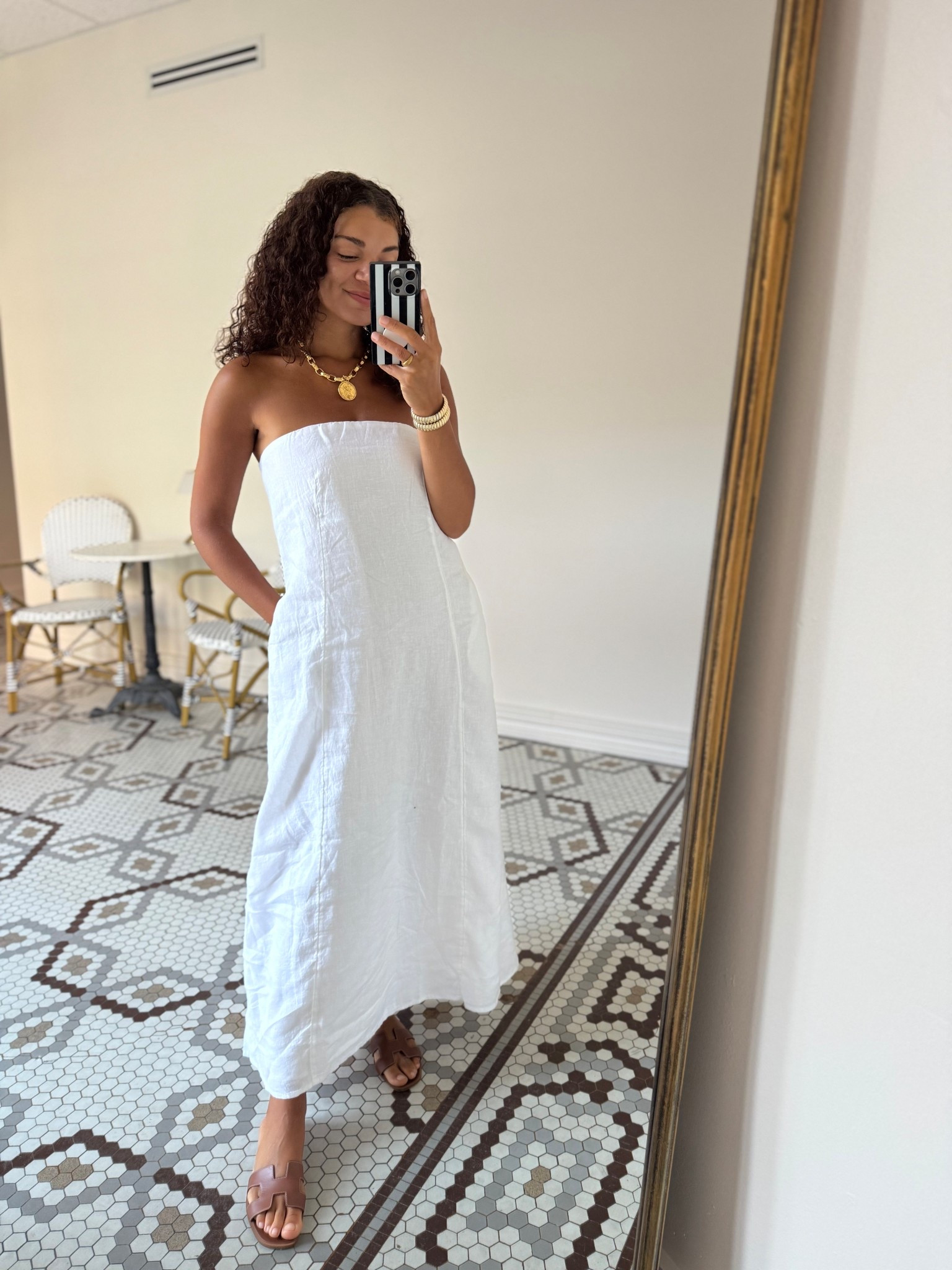 Summer outfit: strapless linen dress, statement chunky gold necklace, gold bracelets, and brown leather sandals 

#LTKStyleTip #LTKSeasonal