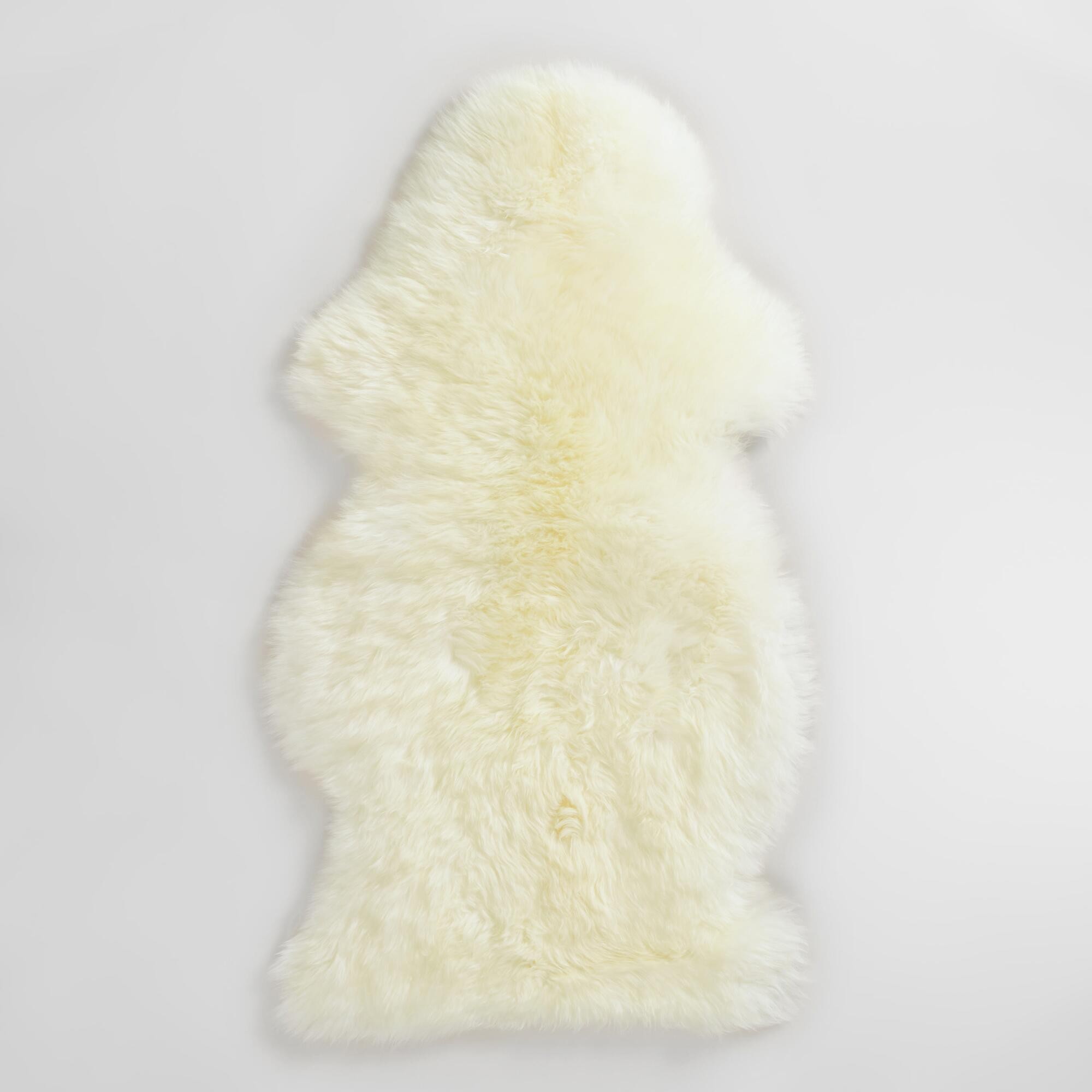 21x37 Ivory New Zealand Sheepskin Area Rug: White by World Market | World Market