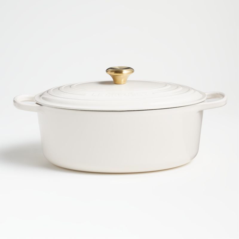 Le Creuset Cream Signature 8-Qt. Oval Dutch Oven + Reviews | Crate and Barrel | Crate & Barrel