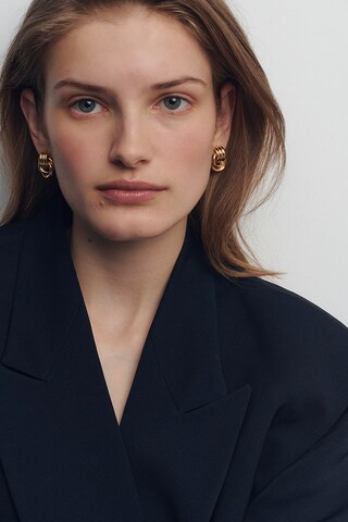 Baby Knot Earrings in Gold | Revolve Clothing (Global)