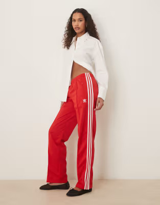 adidas Originals Firebird track pants in red | ASOS (Global)