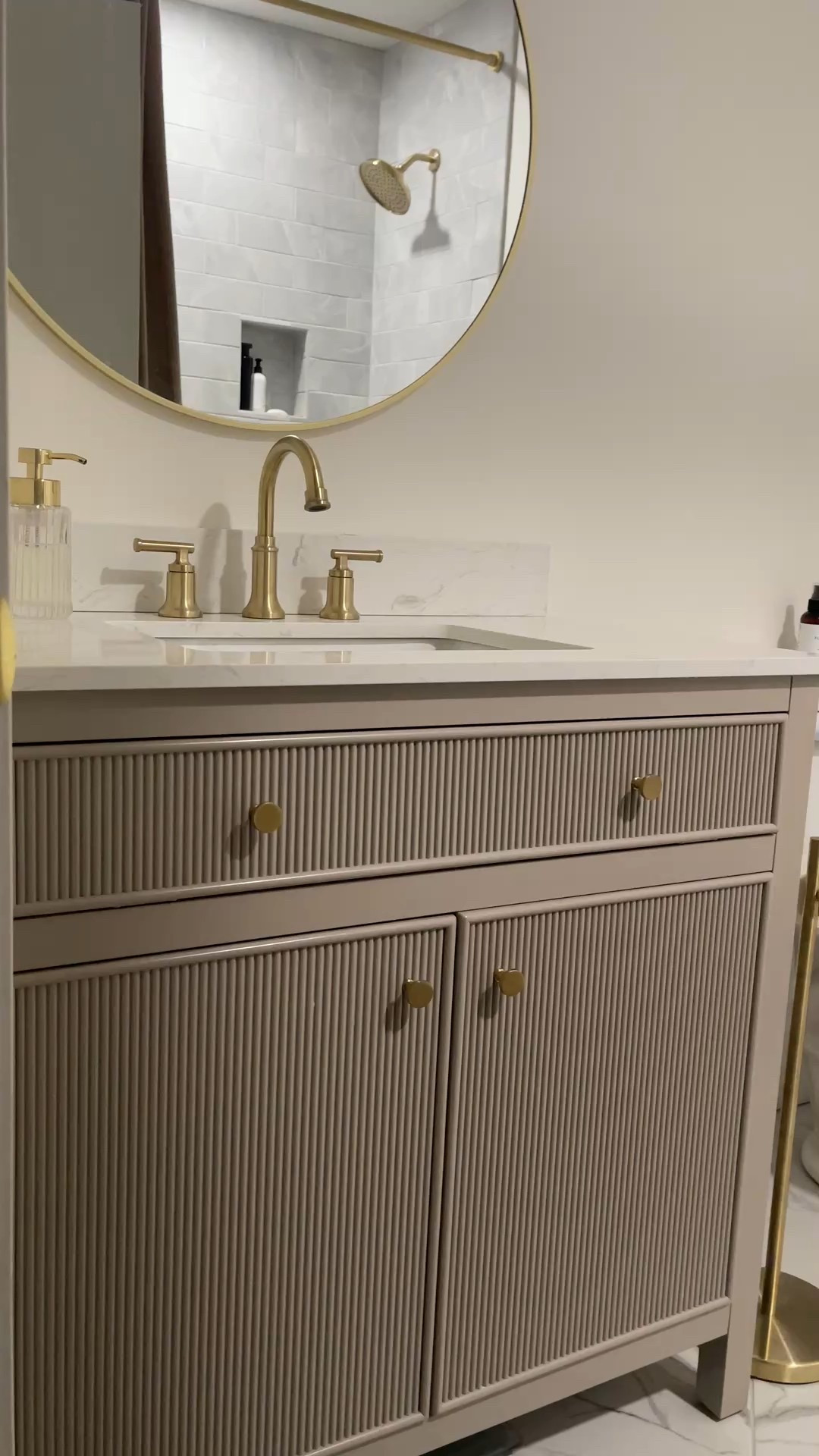 Didn’t know when I got this vanity a year ago it would be the “viral Lowe’s vanity” that it is now. It’s perfect and has plenty of storage for  small space! 

bathroom vanity, gray vanity, fluted vanity, hall bathroom 

#LTKdayinmylife #LTKHome #LTKSaleAlert