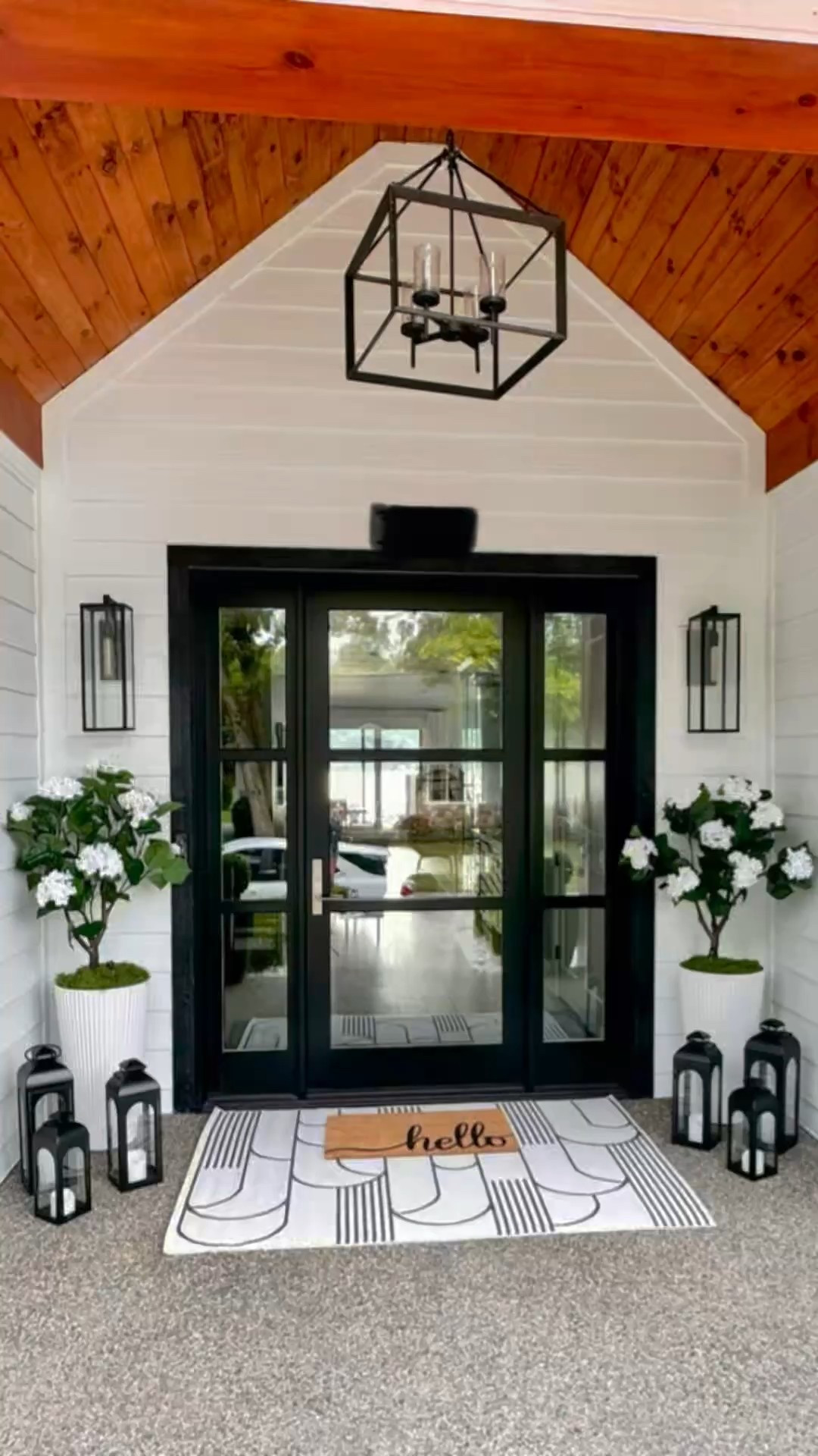 A neutral black-and-white porch refresh is the perfect way to welcome spring and keep your outdoor space looking stylish all summer long. This timeless design creates a fresh, inviting entryway with layered rugs for texture, elegant fluted planters that elevate florals, and classic lanterns for a warm ambiance. The combination of crisp whites and bold black accents feels both modern and classic, making it easy to transition through the seasons effortlessly. Whether using real or artificial greenery, this look is low-maintenance yet high-impact, giving your front porch a polished, welcoming feel that lasts year after year.

Spring Porch, Front Porch Decor, Neutral Home Decor, Walmart Finds, Porch Refresh, Outdoor Decor, Timeless Design

#LTKWatchNow #LTKHome #LTKStyleTip
