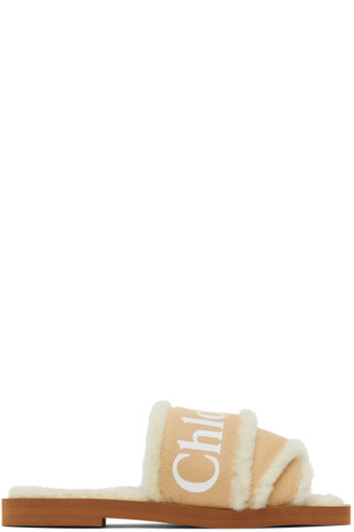 Chloé
                 
                Tan Woody Flat Mules
                
                  ... | SSENSE