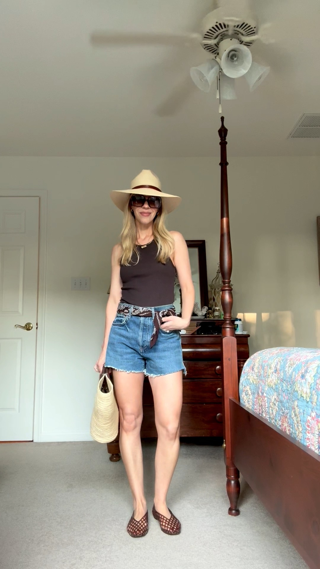 Casual summer outfit over 40, @Janessa Leone straw hat, Citizens of Humanity cutoff denim shorts, bandana scarf, jelly shoes

#LTKSeasonal #LTKOver40 #LTKSaleAlert