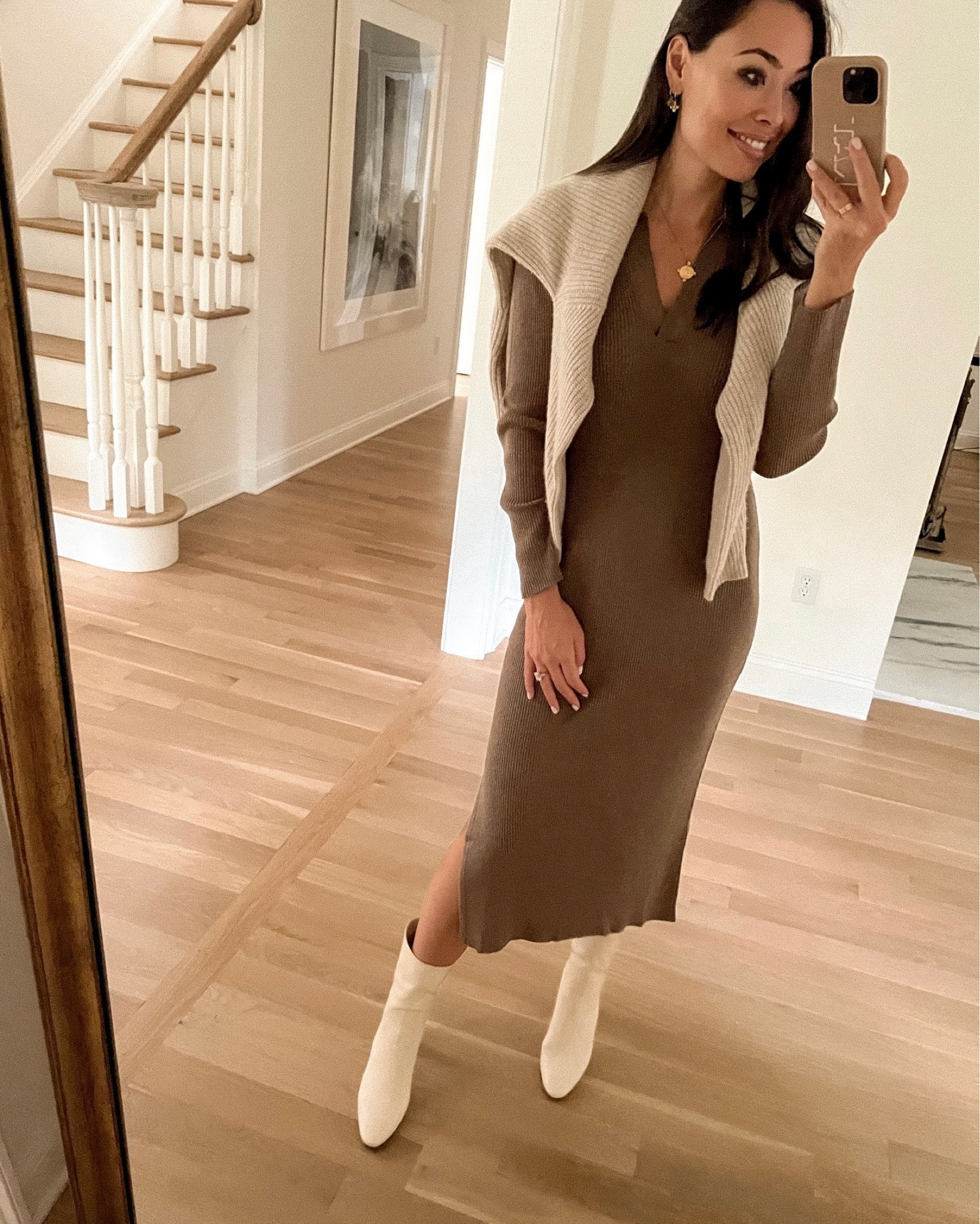 Kat Jamieson of With Love From Kat wears a fall outfit. Sweater dress, cashmere, white booties. 


#LTKshoecrush #LTKworkwear #LTKSeasonal