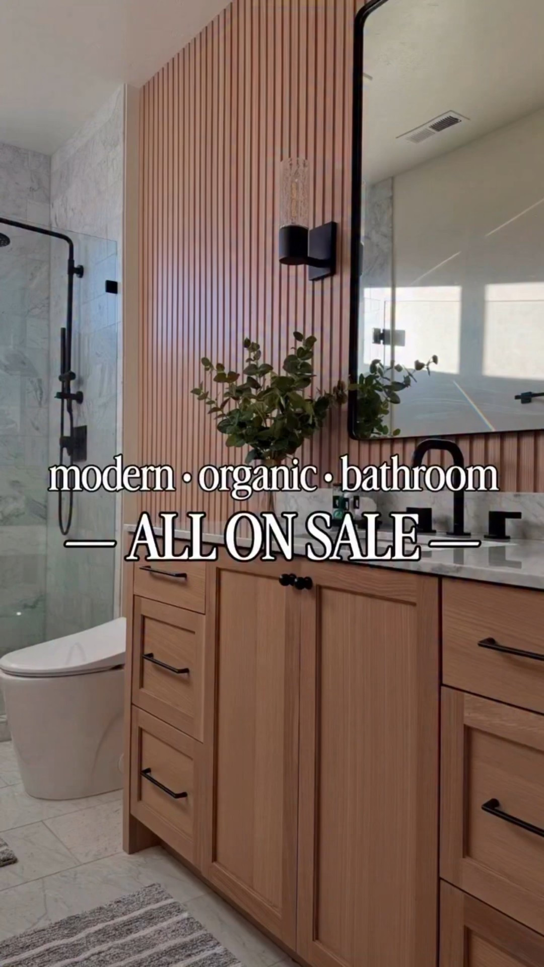 You can recreate this modern organic bathroom without breaking the bank! 🛁✨#WAYDAYDEALS

Every detail — tile, mirror, lighting, plumbing, marble countertop, retrofit shower system, toilet, and even the viral Home Depot slat panels (just $15 each!) — is budget-friendly and available on Wayfair and part of their WAYDAY SALE !!! & Home Depot. Luxe look, major savings!

