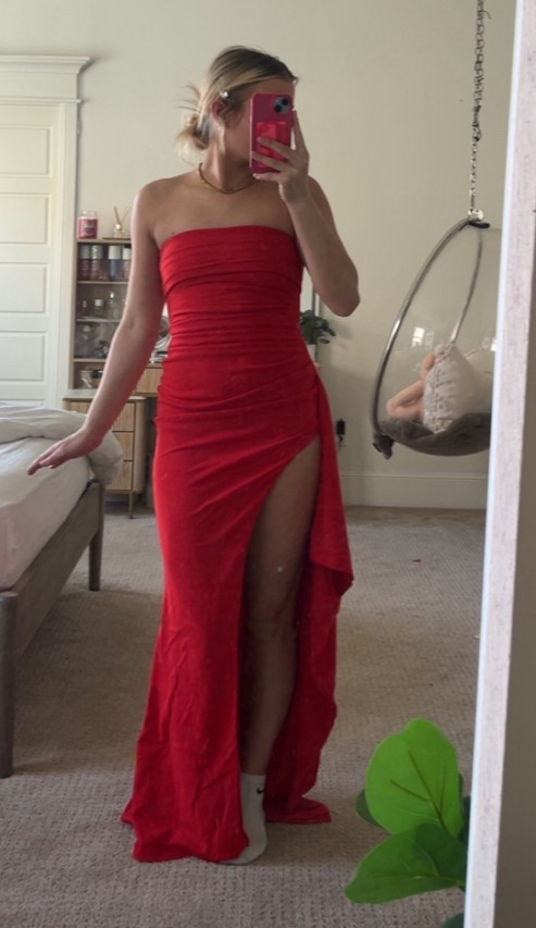 Sweethearts dress for high school 

timeless maxi made in luxury stretch crepe that moulds to your body for a heavenly fit. With a strapless neckline and pleat detailing to the bust and waist, this showstopping look has a thigh high split and soft drape ruffle to one side.

Colour: Red.
Premium stretch crepe fabric.
Fully lined.
Strapless.
Pleat details to bust and waist.
Moulds to body figure.
Thigh high split.
Drape ruffle detail.
Grip tape to internal neckline.
Invisible zipper.
Maxi length.
My daughter is wearing  an XS 