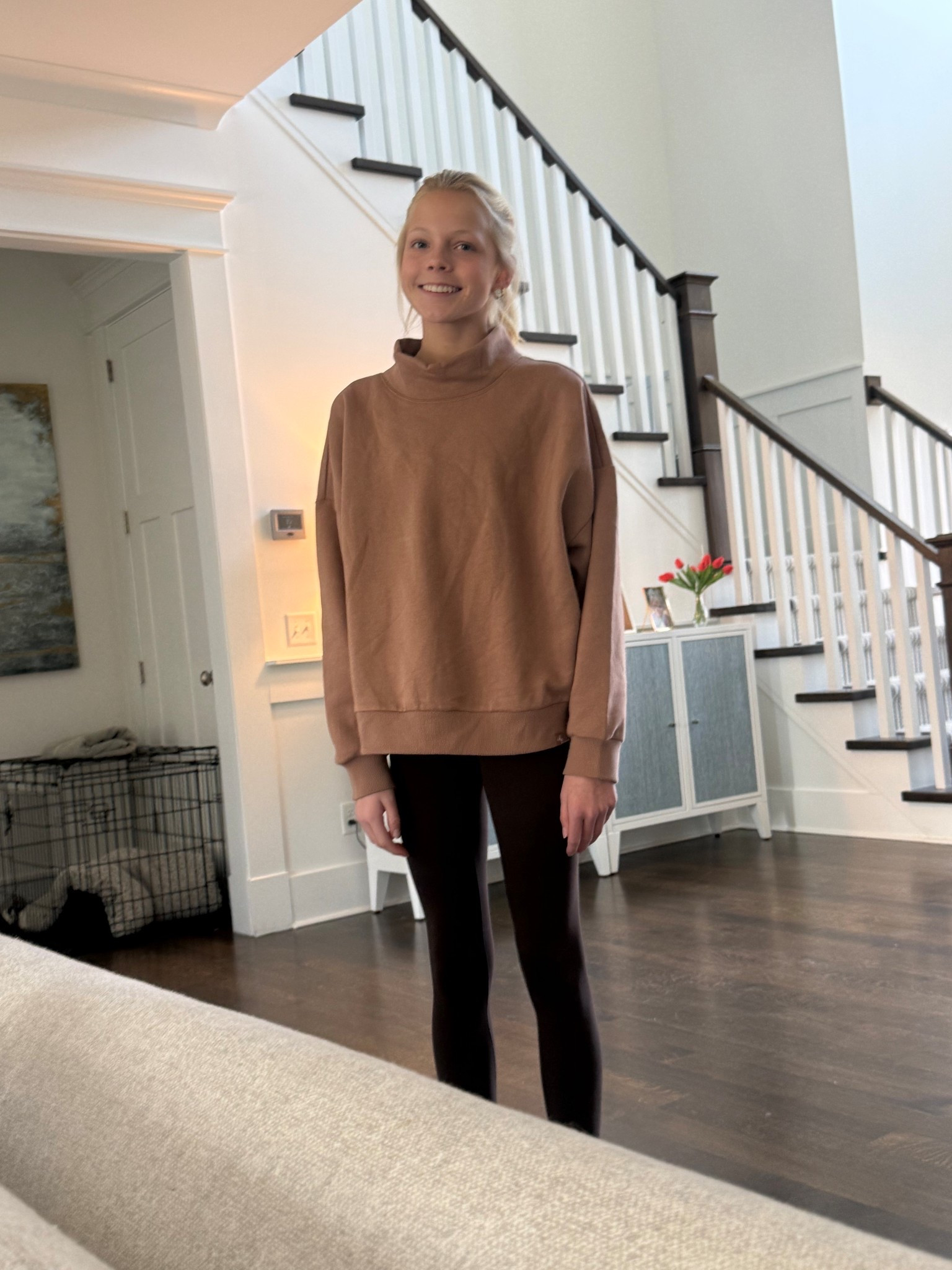 The cutest model in the cutest mock neck sweatshirt 