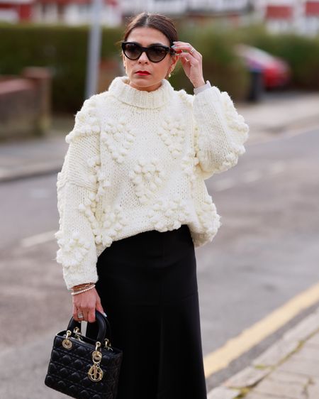 Turtle Neck Chunky White Sweater Black Satin Skirt Lady Dior ABC Black Bag  Prada Sunglasses

#LTKstyletip #LTKeurope #LTKover40
