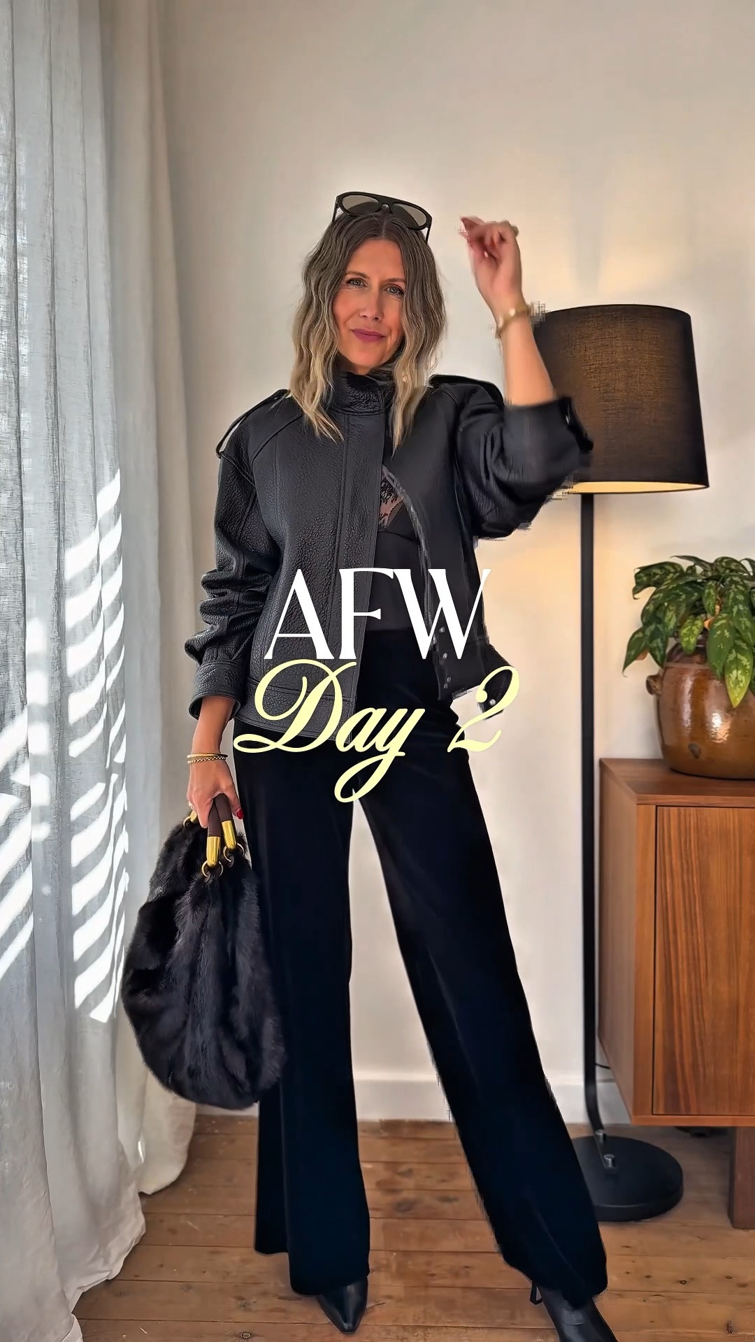 Day 2 of couch-side dress ups for AFW 2026 and this one’s my favourite. 

There’s something about an all-black look that leans into texture — velvet, satin, leather, fur — all the interest without relying on colour. It’s how you take something ‘safe’ and give it depth and a little drama. 

I dragged my vintage Carla Zampatti velvet pants out for this make-believe excursion (and don’t let ‘vintage’ fool you — these get worn A LOT). If I’d actually made it IRL, this is exactly what I would’ve worn to the show. 

Hope everyone stayed somewhat dry out there — but the rain made for the most incredible show. Moody, cinematic, completely on brand!

#LTKaustralia #LTKwinter #LTKautumn