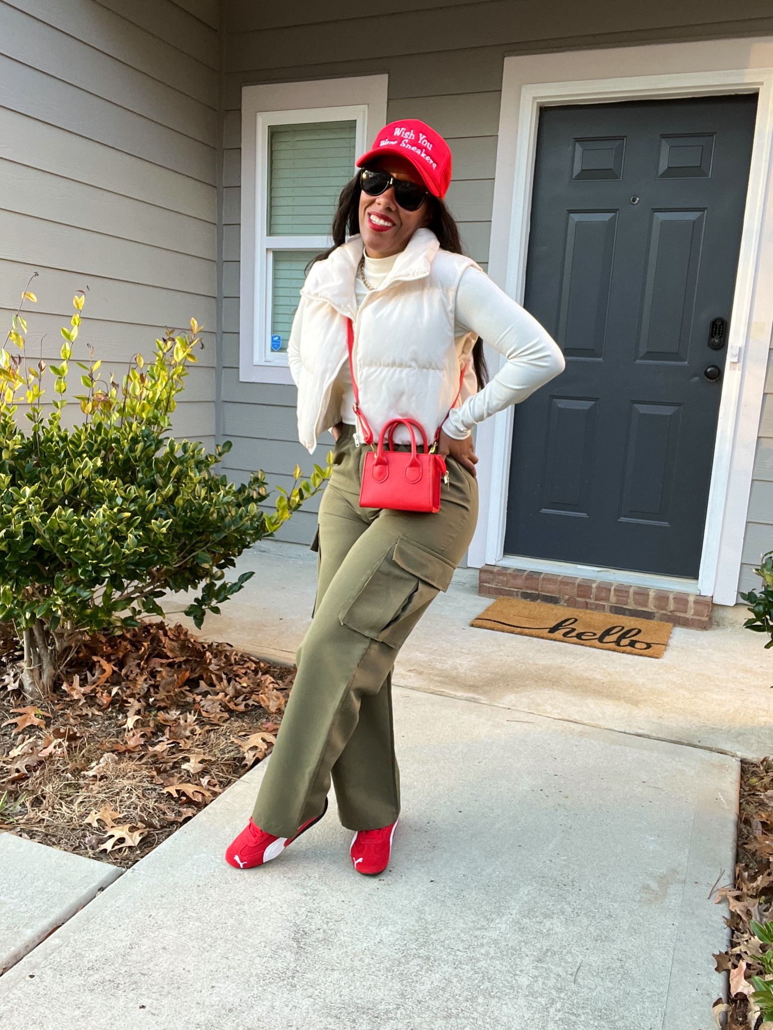 How to style Puma Speedcat with a beige long sleeve shirt, beige puffer vest, red hat, red purse, and green cargo pantss

#LTKShoeCrush #LTKSeasonal #LTKStyleTip