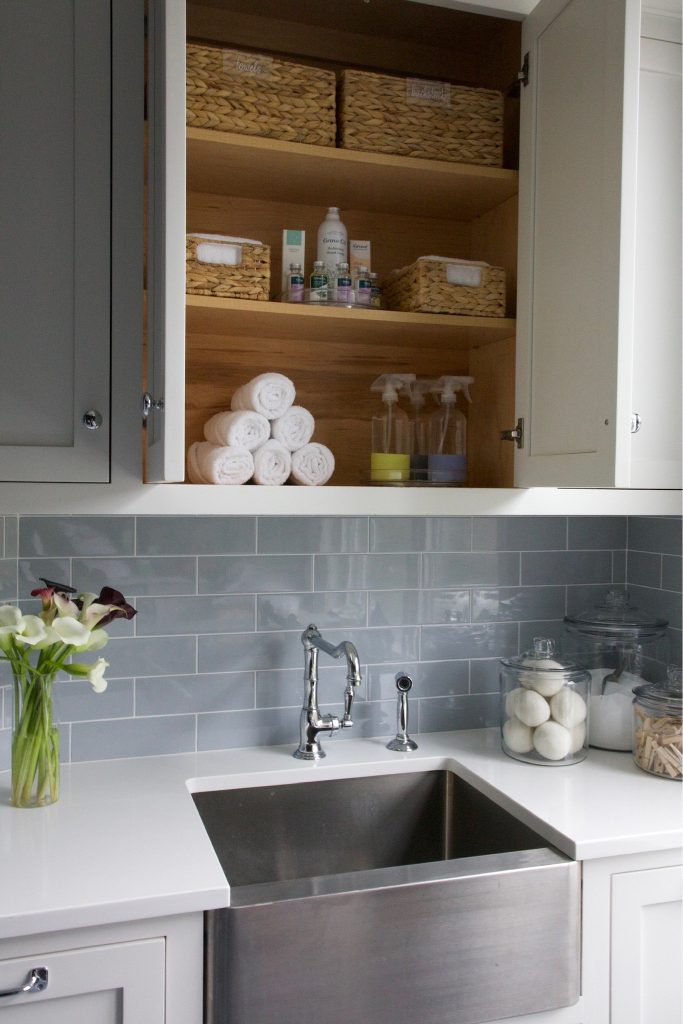 Crisp & clean! We had so much fun organizing this laundry room to be not only beautiful and well organized, but functional. 

#LTKfamily #LTKhome #LTKfindsunder50