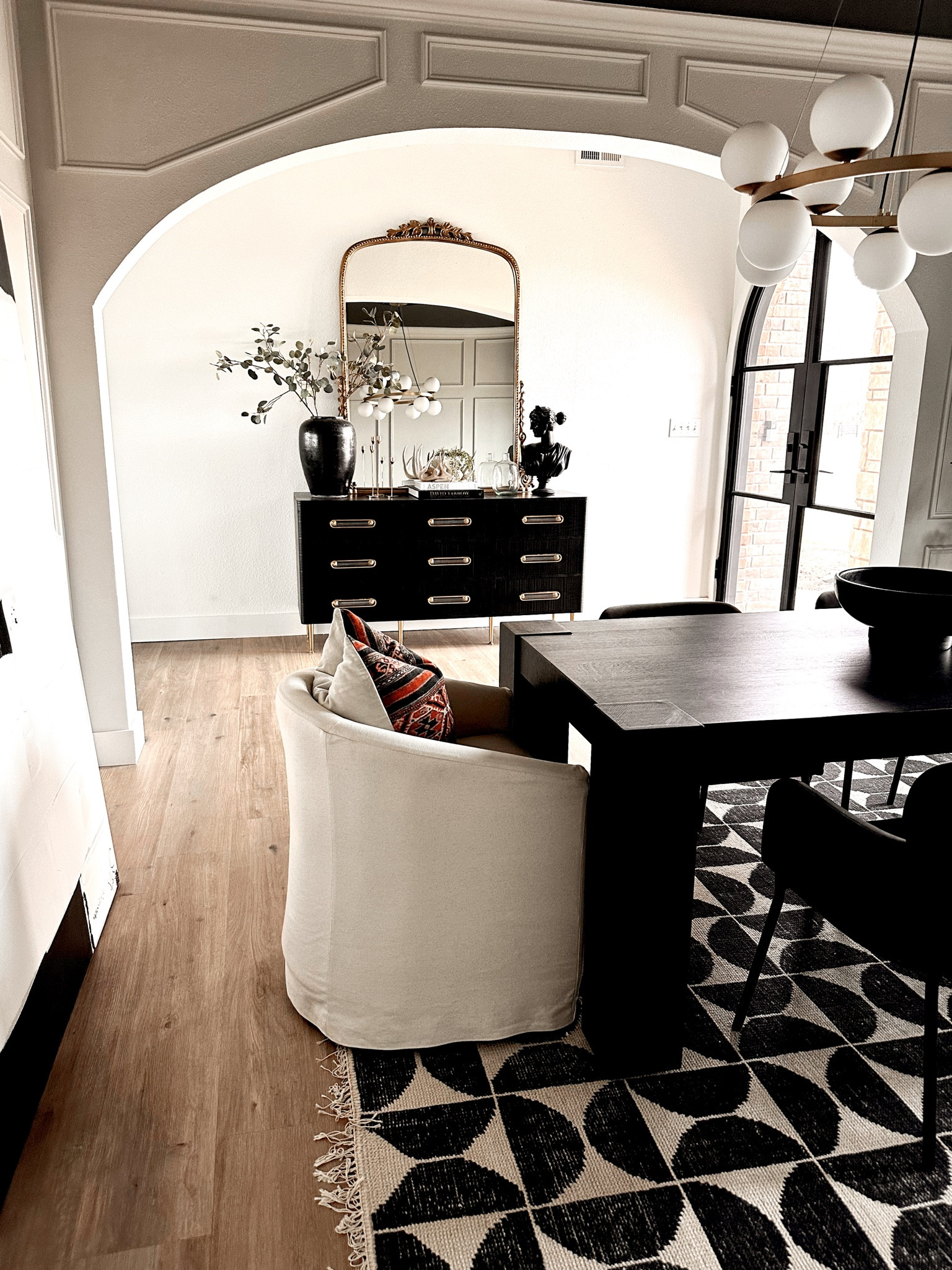 Entry styling dining room decor 
Modern dining room Anthropologie mirror 

#LTKhome #LTKstyletip #LTKFind