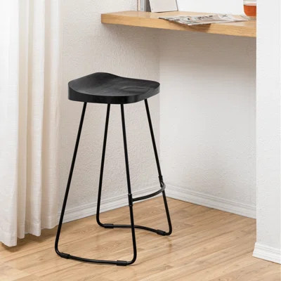 Geonna Saddle Style Solid Wood Bar & Counter Stool with Footrest | Wayfair North America