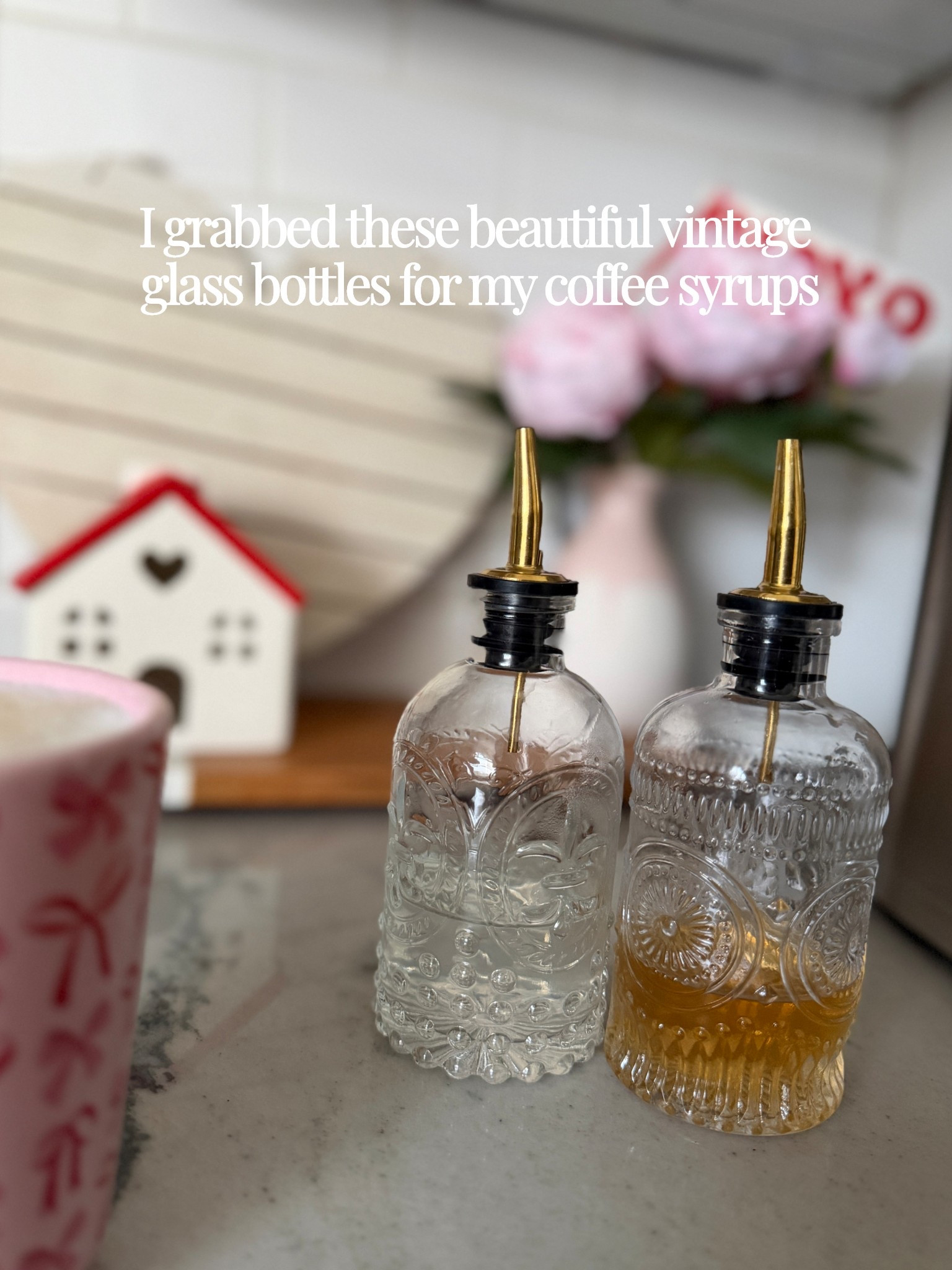 It’s the little things that bring me joy like these syrup glass bottles for my coffee bar area. I’ve been mixing a flavored syrup and protein milk into my coffee and yum! $13 for 2! I keep the black seals on the top when I’m not pouring but took them off for the photo  

#LTKFindsUnder50 #LTKmorningroutine #LTKmomlife
