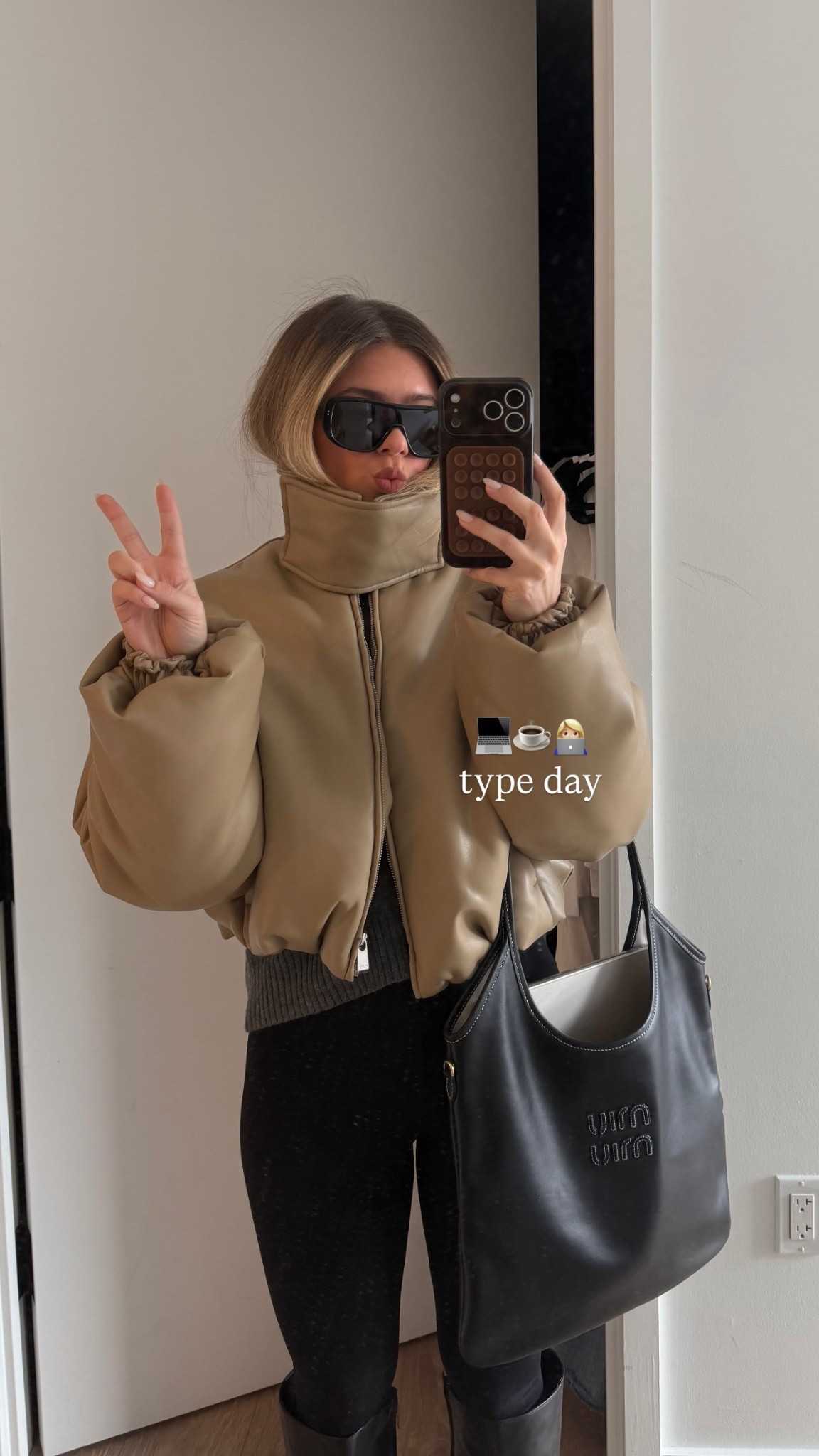 no better feeling than hair tucked in a funnel neck jacket 