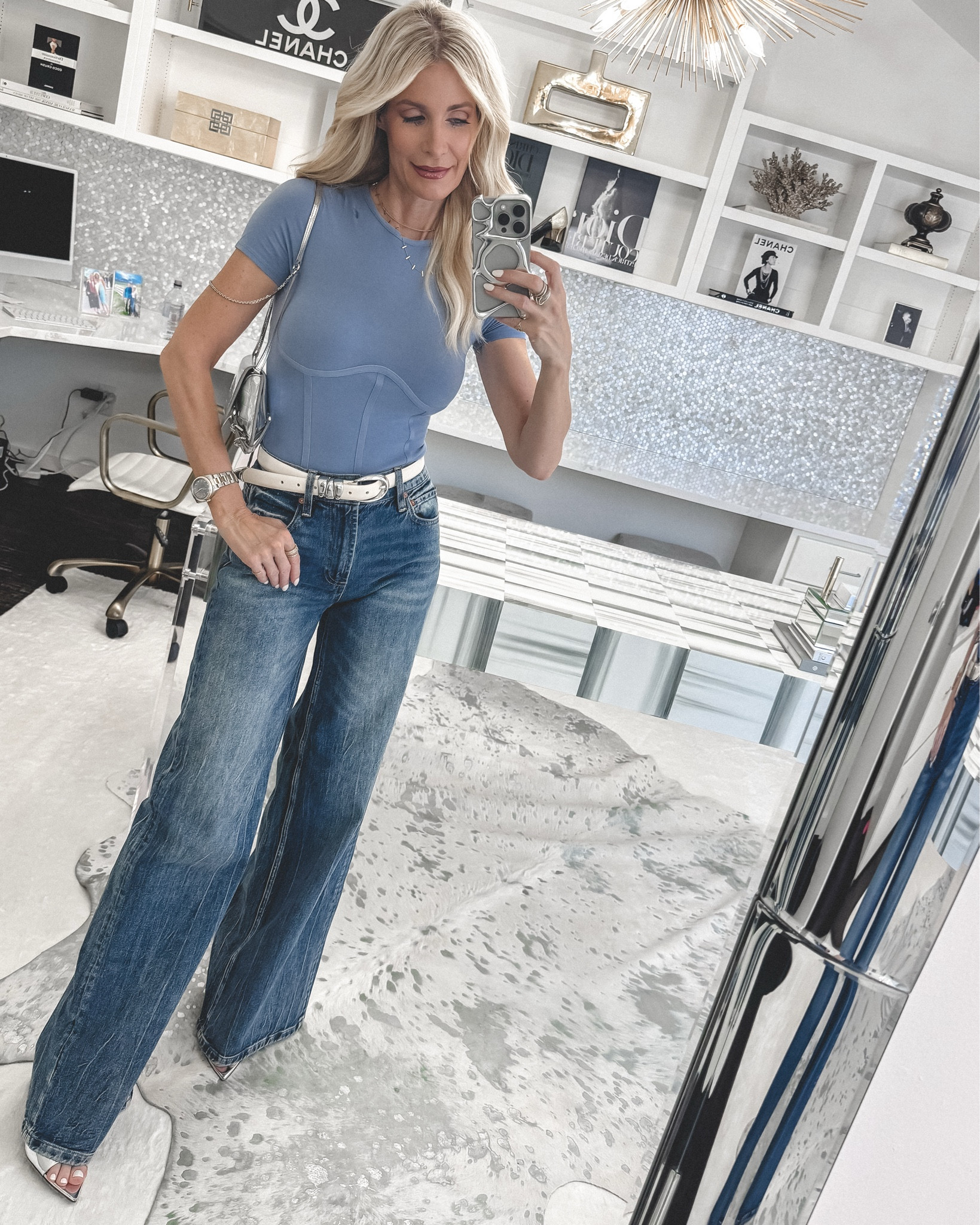 How amazing is this Under $100 blue bodysuit?! I love the tastefully sexy detailing in the bust area, and I styled it with an amazing pair of wide-leg jeans in a versatile medium blue wash, perfect for any time of year! I'm wearing an XS in the bodysuit and a size 24 in the jeans. 

 #LTKSeasonal #LTKOver40 #LTKStyleTip