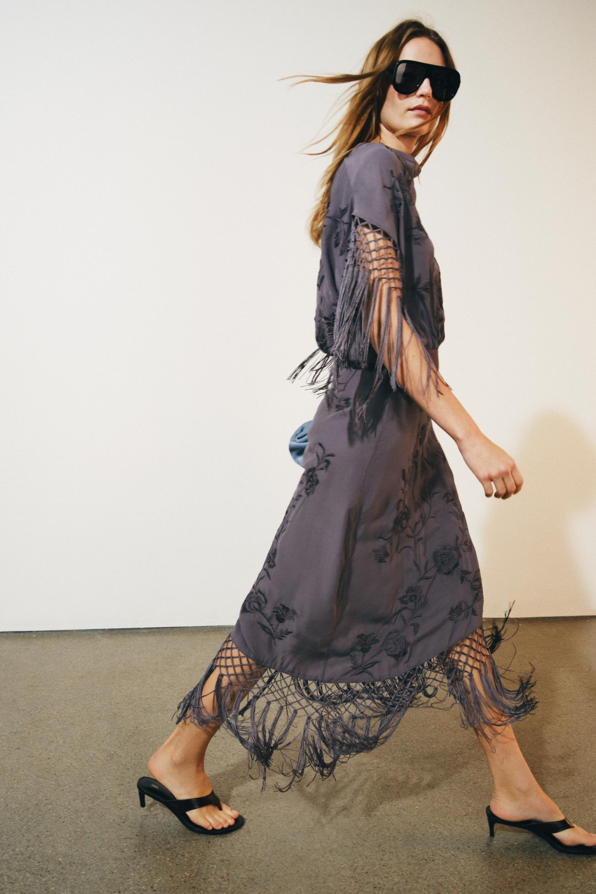 ZARA WOMAN COLLECTIONDress crafted from viscose yarn. Features a fluid neckline and short sleeves... | Zara US