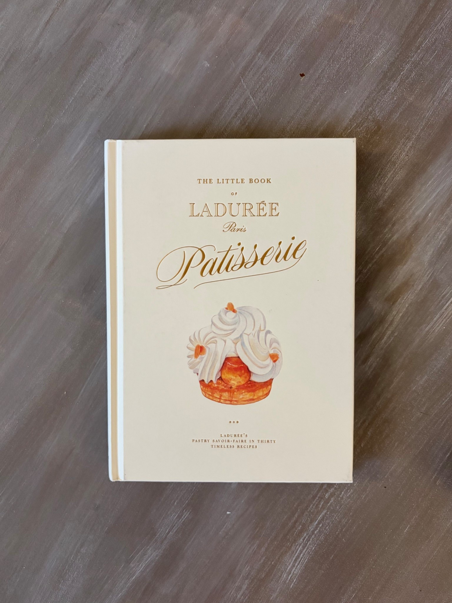 found the perfect little coffee table book!! currently on sale for $7.84! such a steal 🧁🍰🍡🩷 

#coffeetablebook #recipebook #laduree #home 

#LTKHome #LTKfoodie