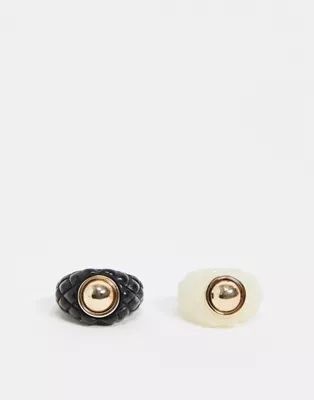 ASOS DESIGN pack of 2 rings in studded plastic resin in black and white | ASOS (Global)