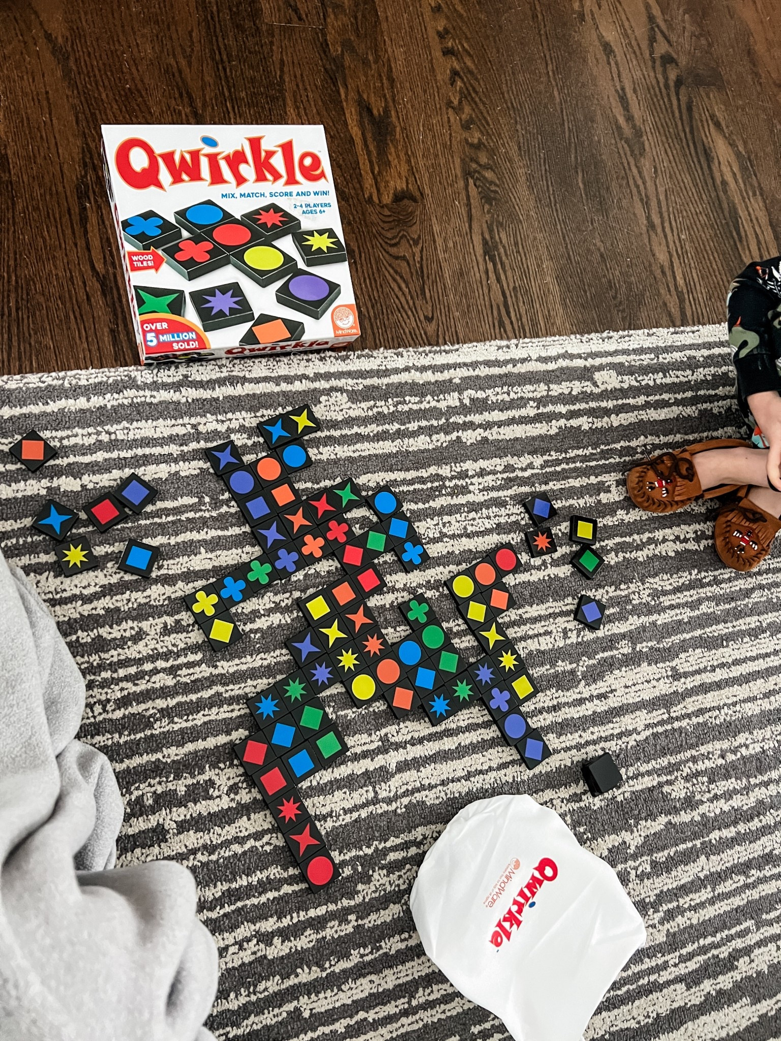 New game unlocked in 2026. My 5 year old does really well at this game, we don’t keep score, but we try to be the first person to play all their tiles and work on finding the high scoring plays each round. Fair warning it does take a while to play so your kiddo would need to like the game/have some patience to finish it. 

#LTKmomlife #LTKHome #LTKKids