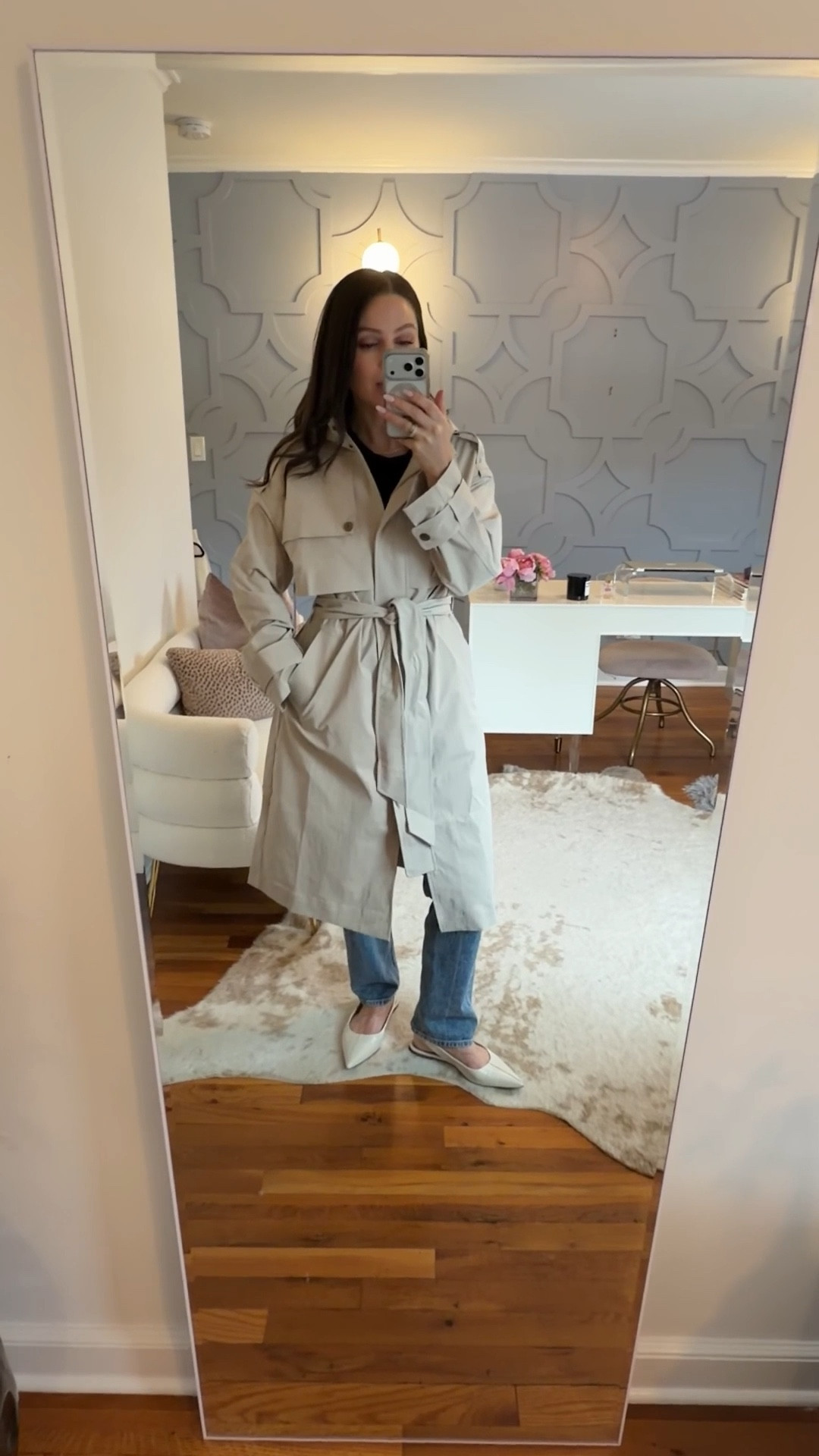 A classic trench that’s also weather-proof. Comes in multiple colors. Obsessed. This is my true size small  