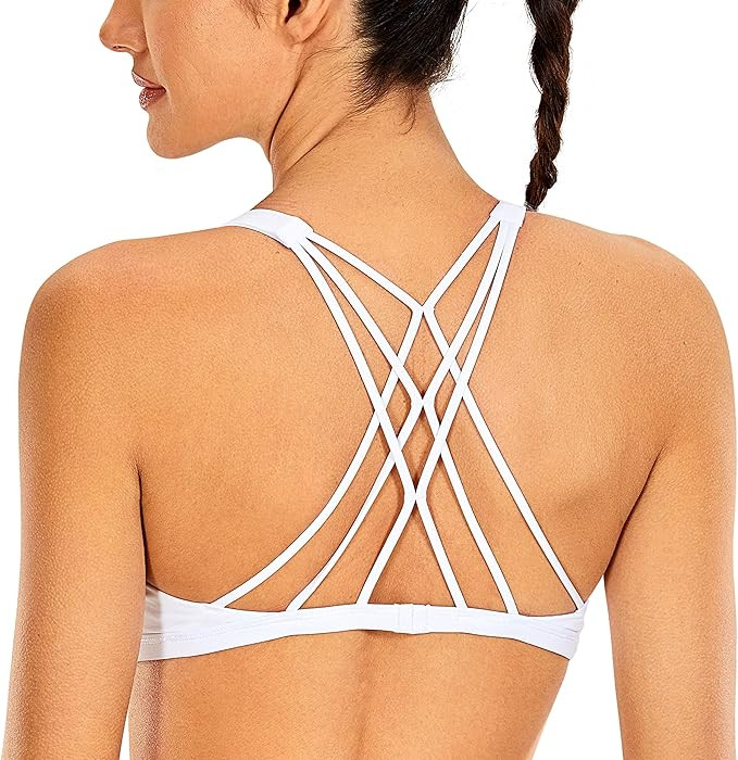 CRZ YOGA Women's Cute Yoga Sports Bra Strappy Sexy Back Padded Low Impact Workout Clothes Bra Top... | Amazon (US)