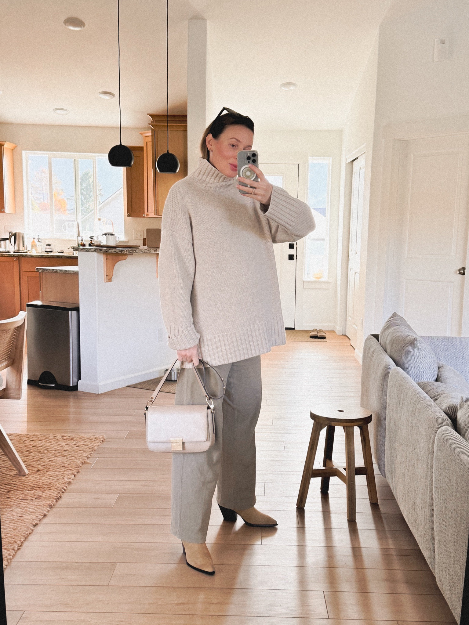 OOTD: covering up my baby bump with COS cashmere sweater, styling it with Buck Mason interloop wide leg sweatpants + Aeyde Ariel boots + my good old faithful Michael Kors flap bag (linked to my Poshmark closet). 

#LTKBump #LTKSeasonal #LTKFindsUnder100