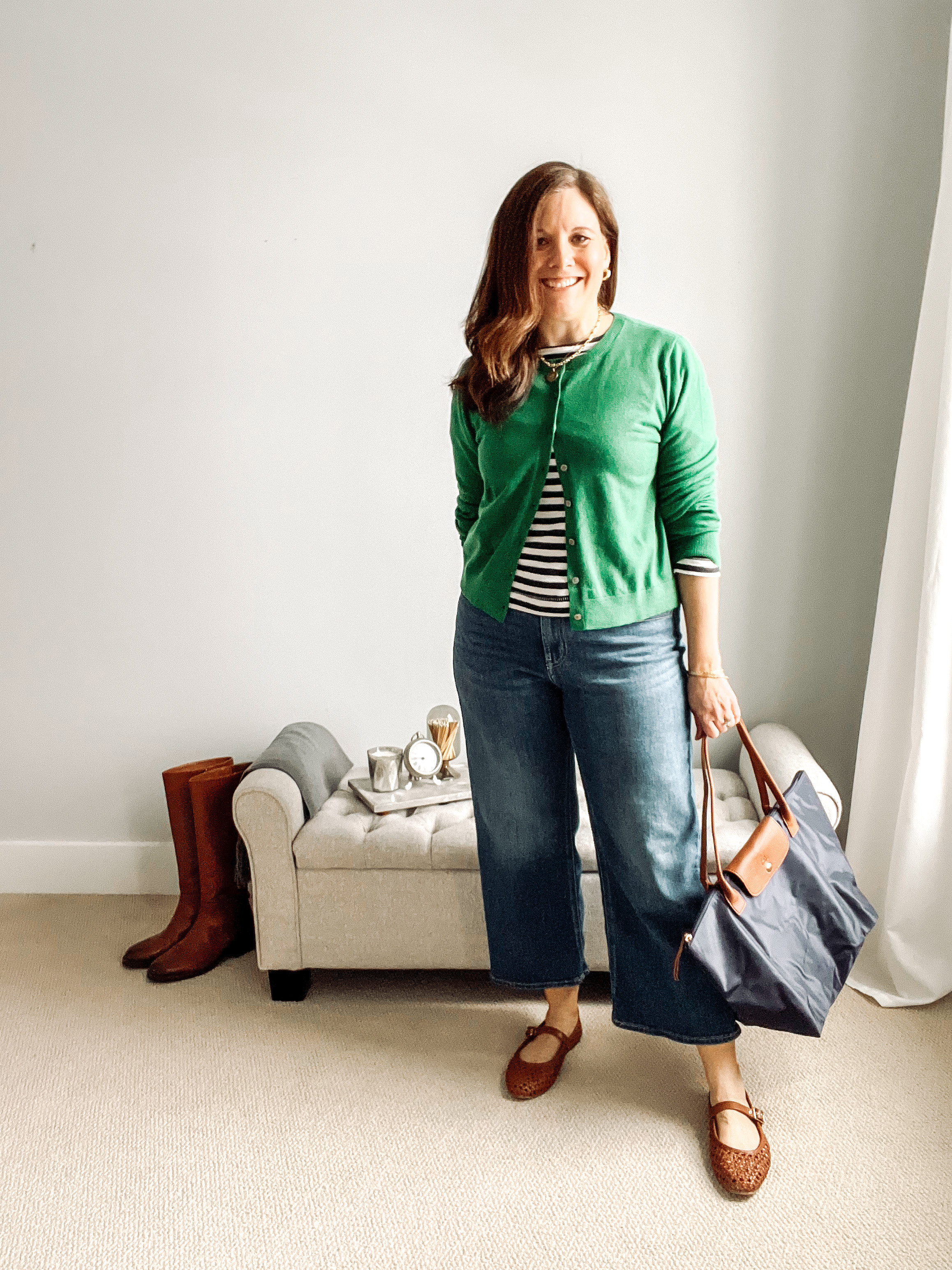 I’m layering that green cardigan over the striped shirt from my capsule wardrobe. I’ve left the shirt untucked for a laid back look. Pushing up the sleeves helps to draw the eye to the waist. Fit notes: Cardigan- L, Striped shirt- S, Jeans- TTS, Mary Janes- Go down a half size. #SpringCapsuleWardrobe #SpringOutfit


#LTKStyleTip #LTKSaleAlert #LTKMidsize