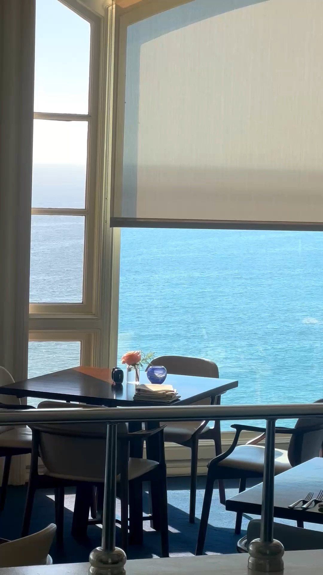 Dining along the ocean, softened by the most elegant Roman shades. They gently filter the strong afternoon sunlight without taking away from the beautiful coastal view—creating a space that feels cool, serene, and effortlessly sophisticated.

Shop the Roman shades, dining chairs, tableware, glassware, and coastal dining essentials.

#OceanView #CoastalDining #RomanShades #WindowTreatments #SunlightFiltering #CoastalInteriors #ElegantDining #DiningRoomInspiration #RelaxedElegance #LTKHome
