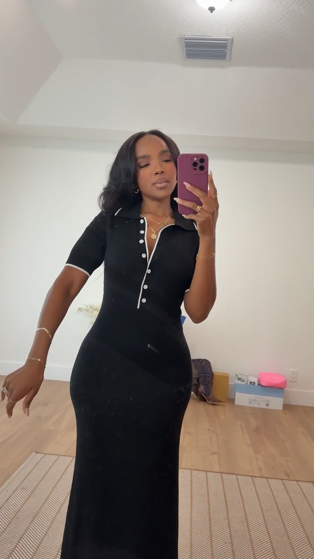 Effortless everyday elegance with a polished twist — this black button-front midi dress is one of those throw-on-and-go pieces that always looks put together. The contrast trim and fitted silhouette make it feel elevated while still being comfortable enough for all-day wear. This is one of those staples you’ll keep reaching for season after season.

Perfect for casual dinners, errands with style, travel days, or dressed-up daytime plans.

📏 Sizing:
Wearing size Small  
Height: 5'4"  
Weight: 138 lbs  
Bust: 34D  
Waist: 27"  
Hips: 40"

This dress is a great long-term wardrobe staple — easy to dress up or down, and the cost per wear drops fast because it works for so many occasions.

Black midi dress, button front dress, everyday black dress, fitted midi dress, neutral wardrobe staple, capsule wardrobe dress, versatile outfit idea.

Tap to get details and shop it instantly on the app.

Follow me on Instagram and YouTube @kirasfashionfinds