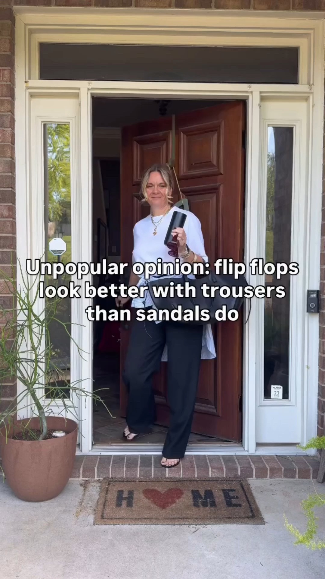 Unpopular opinion: flip flops look better with trousers than sandals do 👇

Here’s why:

✨The casualness is the whole point. A dressy sandal with trousers reads as trying too hard. A flip flop creates the kind of contrast that makes an outfit feel effortless and confident instead of overly polished.

✨It’s having a real moment right now. Flip flops are showing up everywhere from street style to runway looks — paired with trousers, they’re one of the most current shoe choices you can make.

✨It proves you don’t need a “fancy” shoe to look put together. When the rest of your outfit is intentional — a great trouser, a tied layering piece — the shoe can be as simple as it gets and the whole look still reads as styled.

OOTD for an easy weekend ✨ Oversized white tee + black trousers + a shirt tied at the waist + black jelly flip flops. All from my own closet — linked the closest versions I could find. Everything shoppable below! 👇

#LTKdayinmylife #LTKootd #LTKOver40

Comment SHOP below to receive a DM with the link to this post on my LTK ⬇ https://liketk.it/6gocL