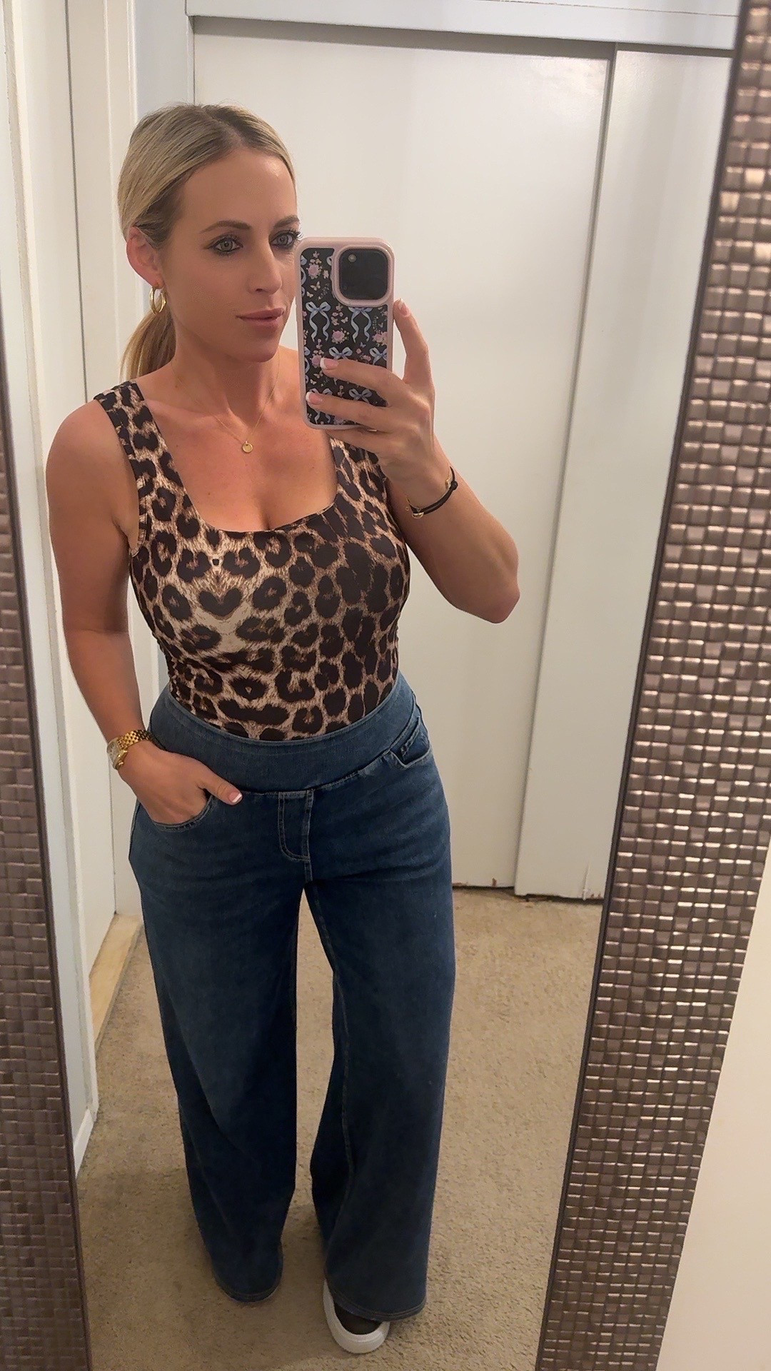 Date night outfit. Stretch jeans. Platform sneakers. Faux leather jacket. Leopard print. Hoop earrings 

